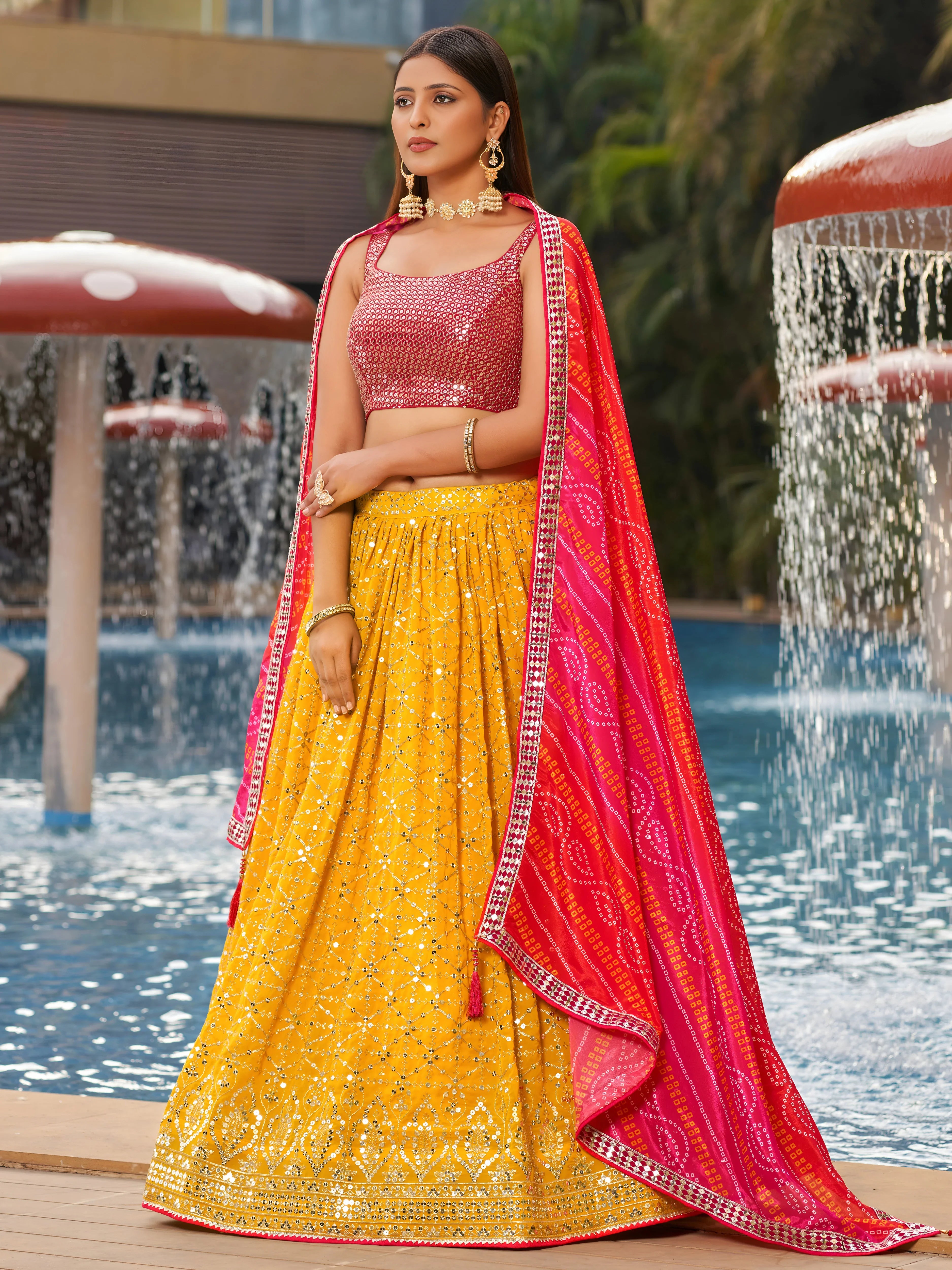 Navya sunlit yellow embroidered lehenga choli with Bandhani dupatta