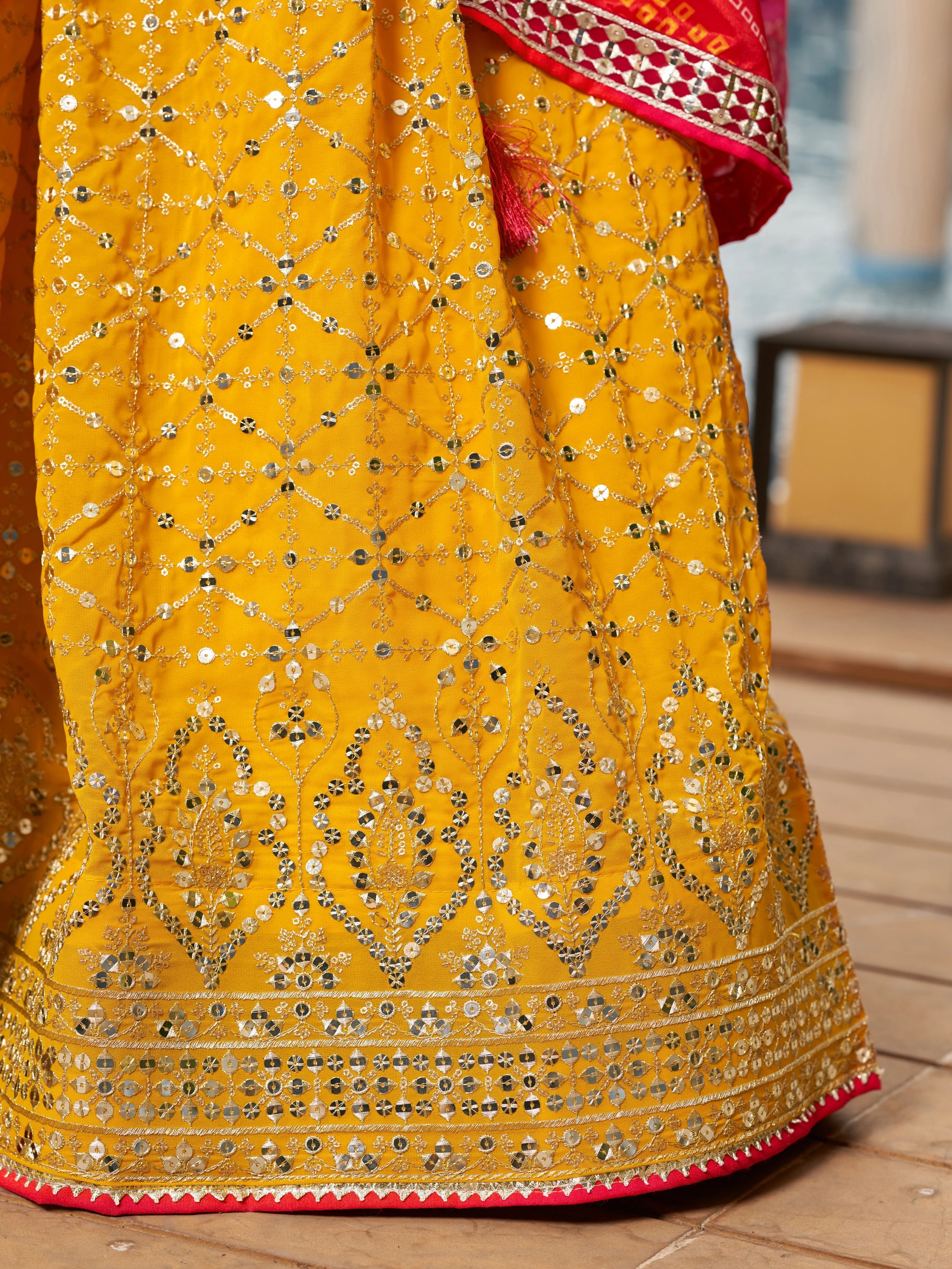 Navya sunlit yellow embroidered lehenga choli with Bandhani dupatta