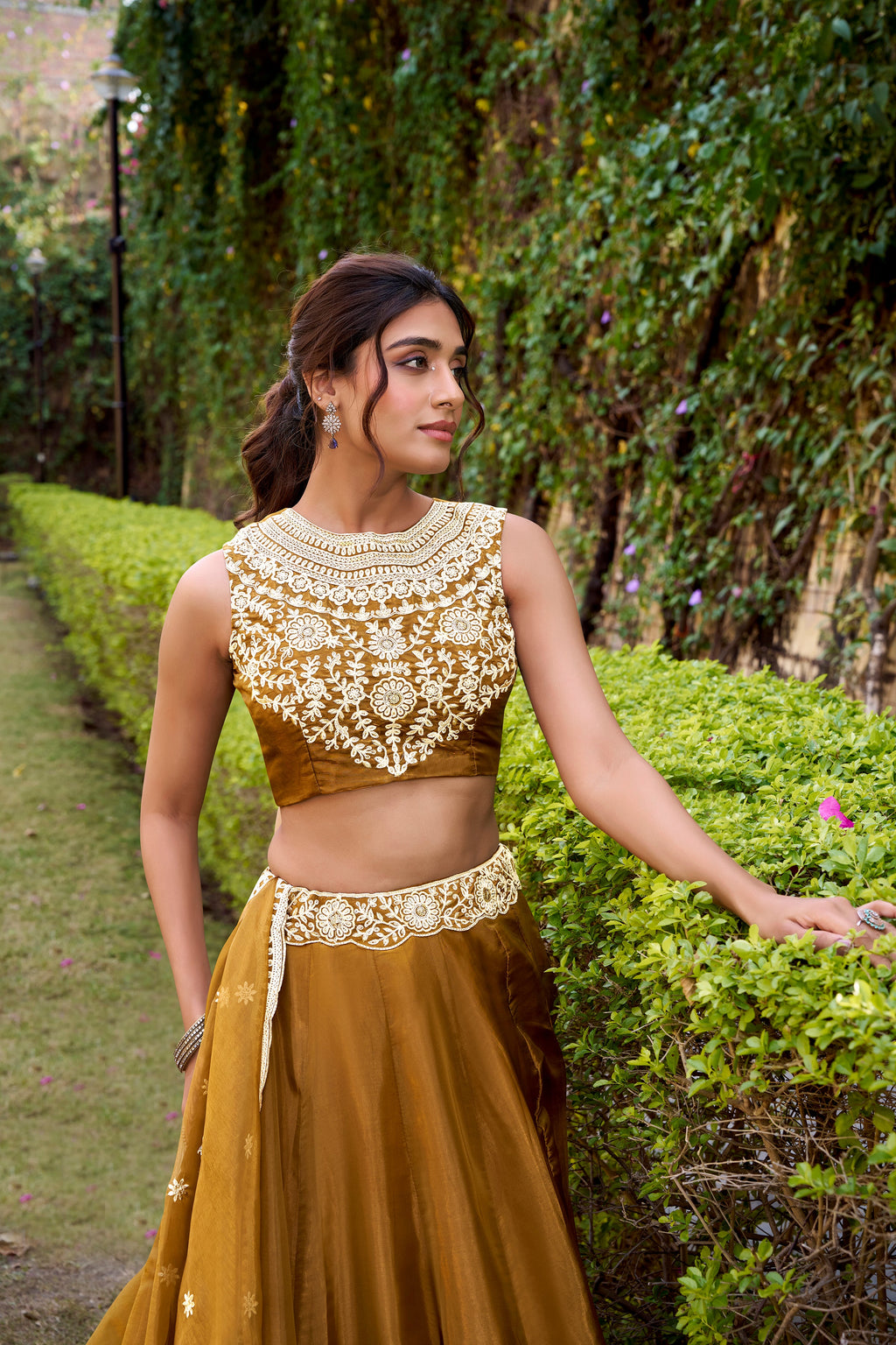 Nayana gold Chanda silk lehenga choli with sequins thread embroidery work