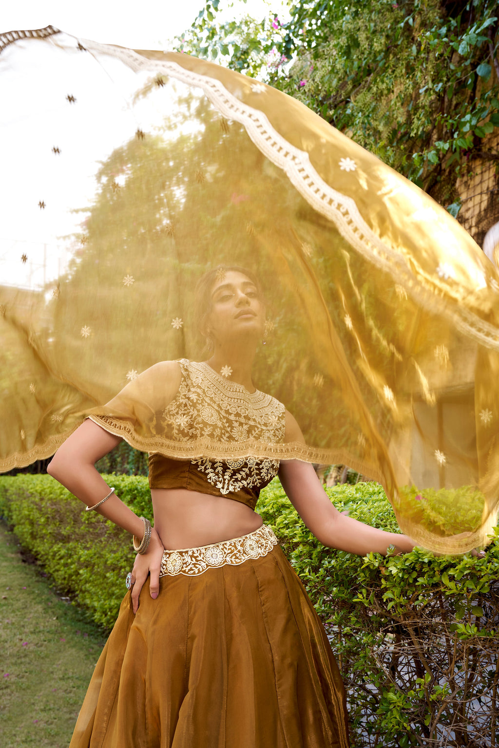 Nayana gold Chanda silk lehenga choli with sequins thread embroidery work