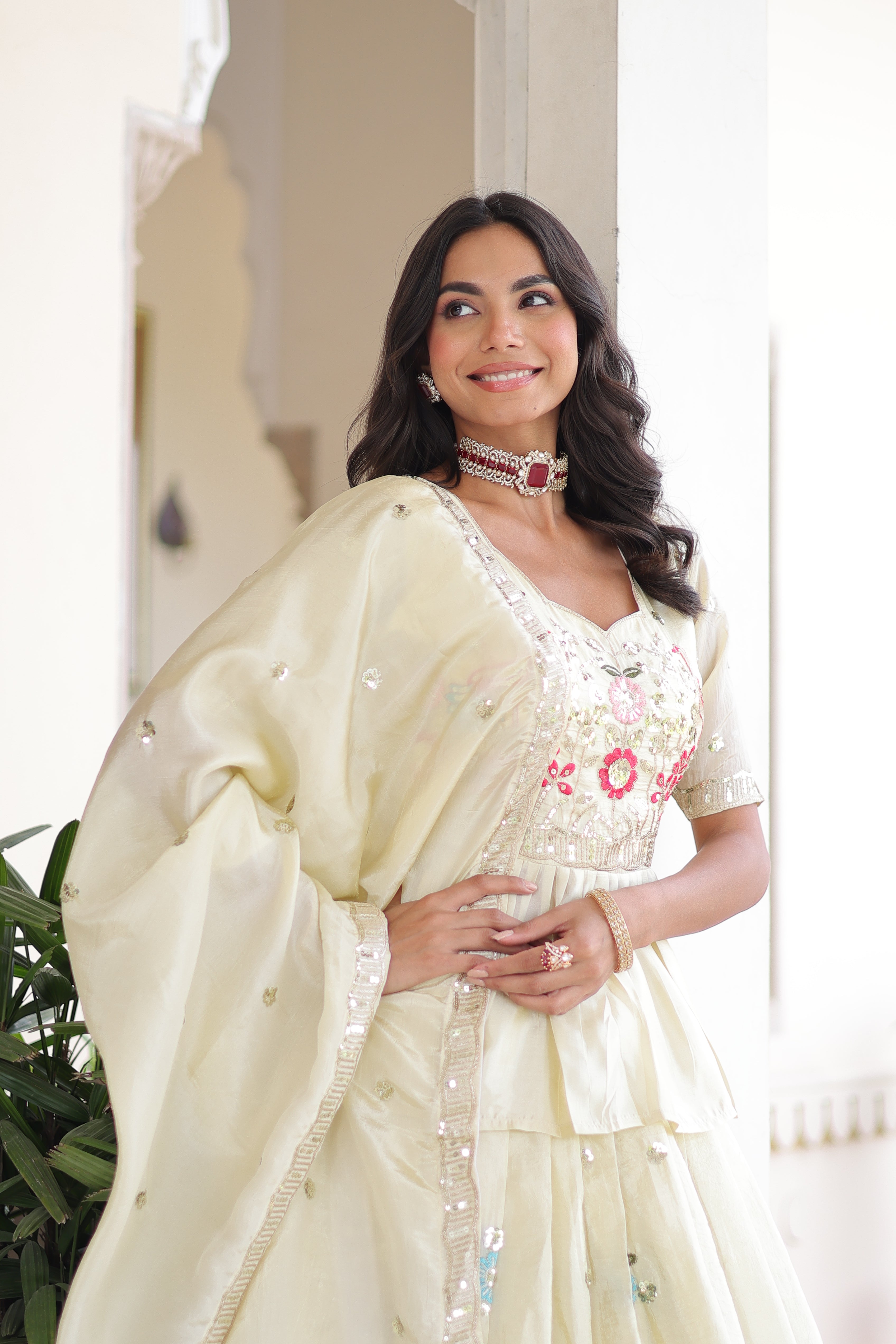 Nimi off-white gold crush lehenga choli with embroidery zari sequins work