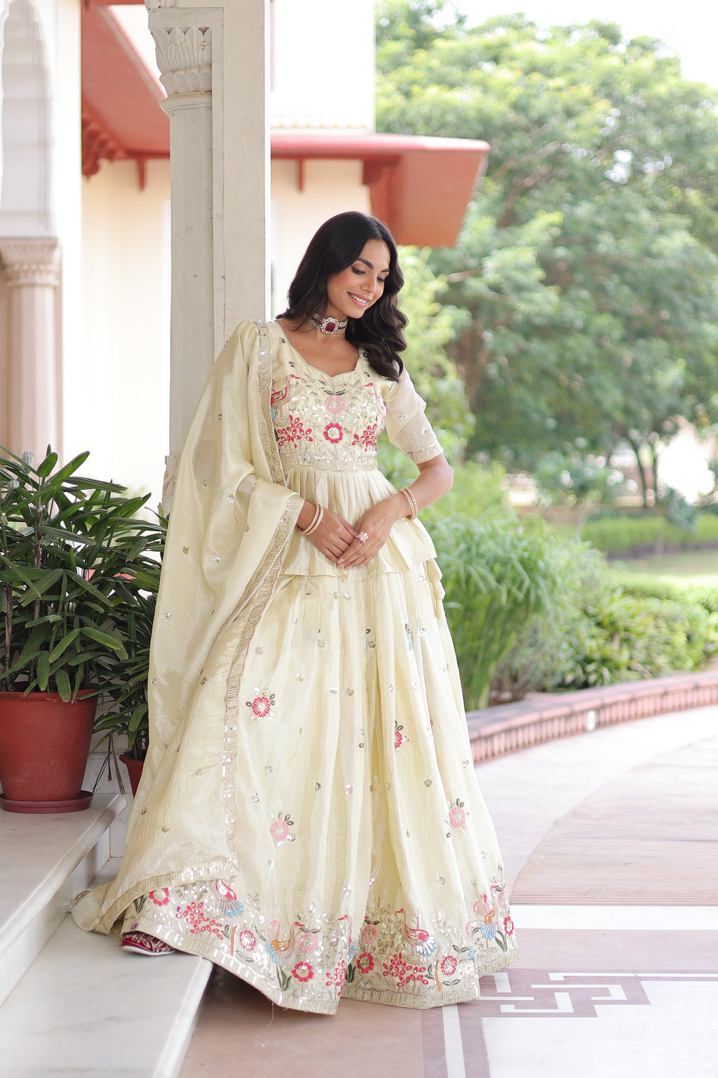 Nimi off-white gold crush lehenga choli with embroidery zari sequins work