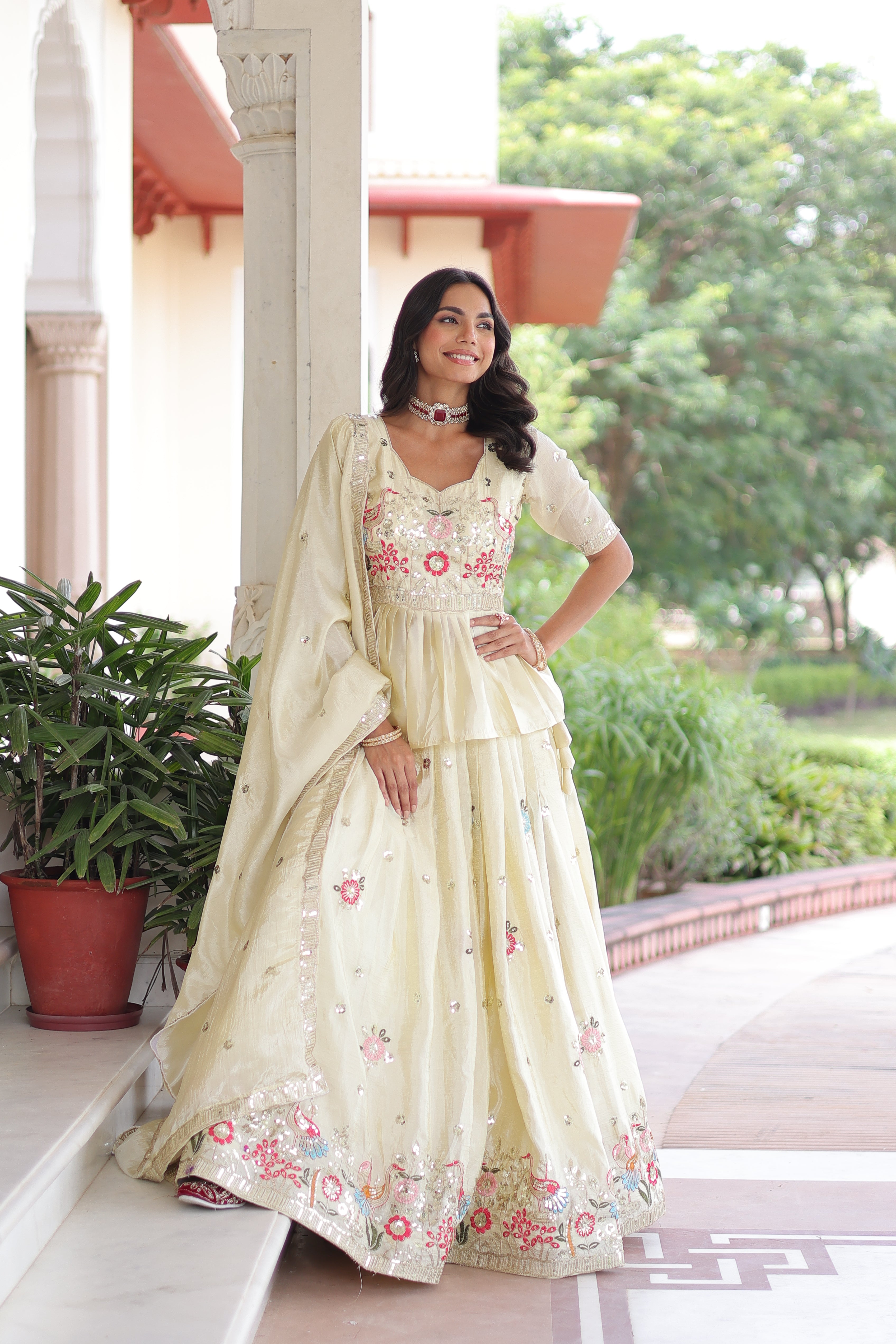 Nimi off-white gold crush lehenga choli with embroidery zari sequins work