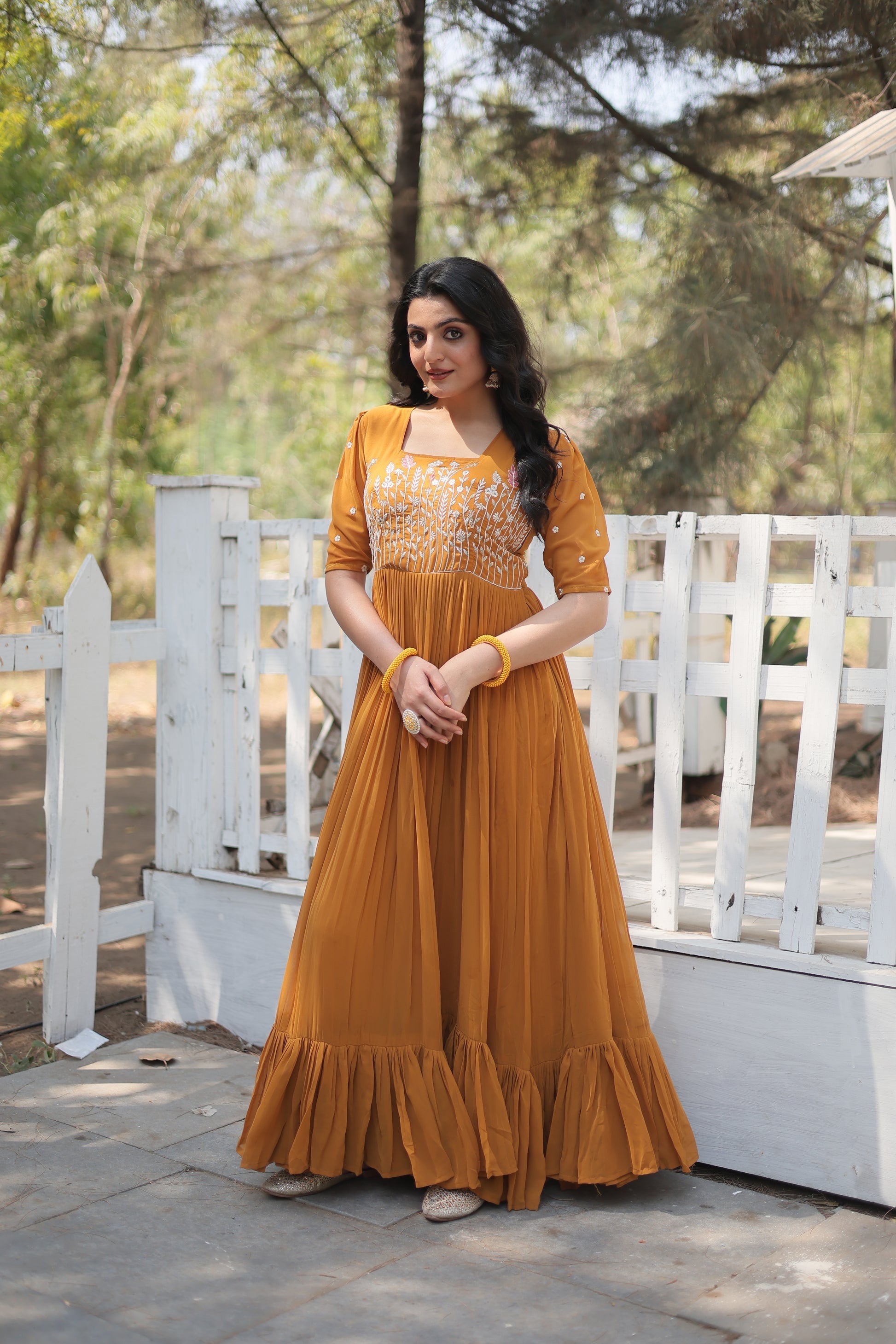 Nitara mustard yellow georgette embroidered Anarkali gown