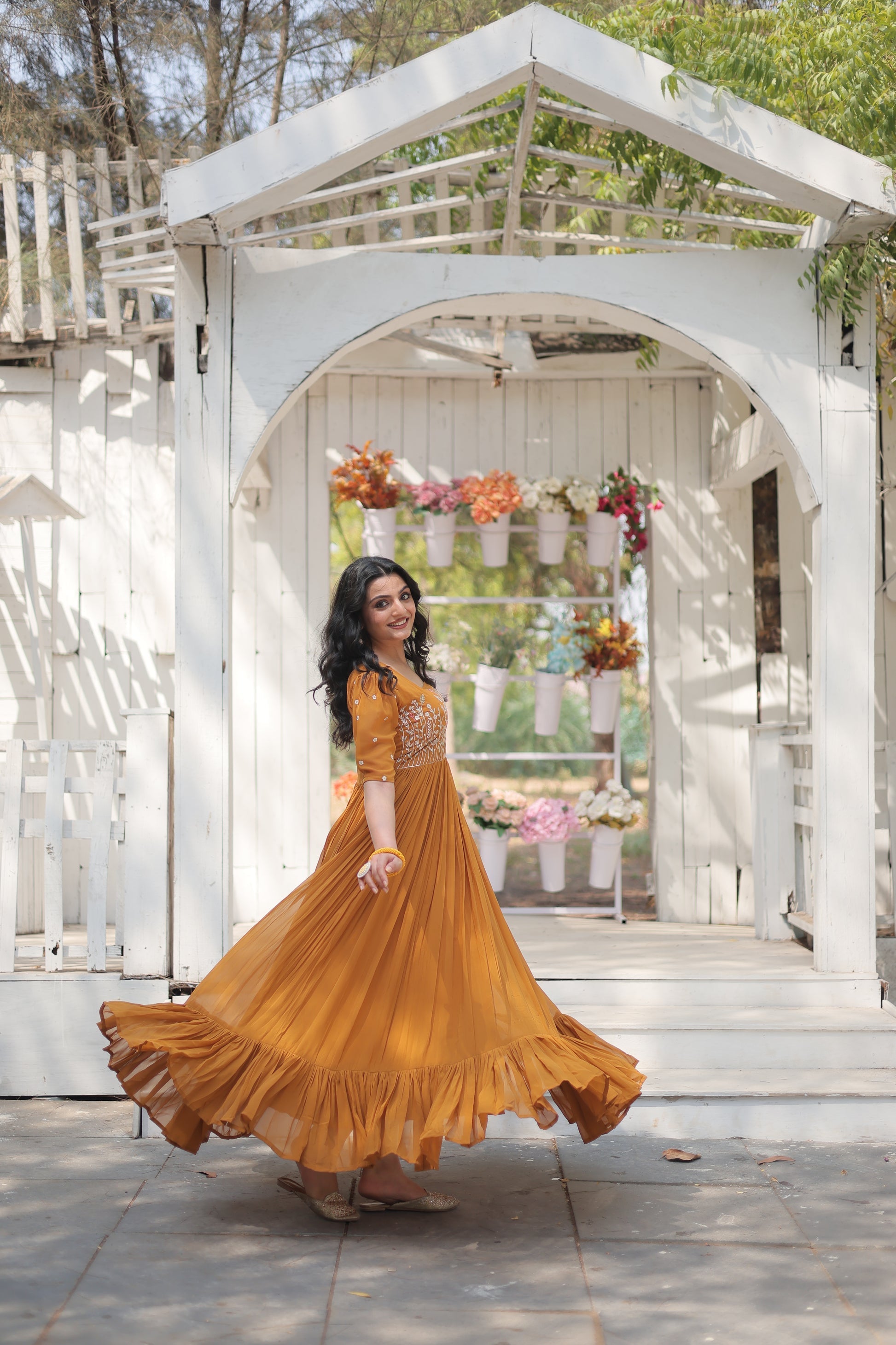 Nitara mustard yellow georgette embroidered Anarkali gown