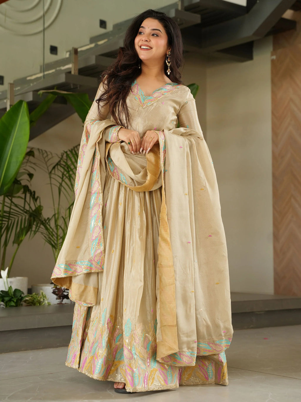Off white chinnon gown with sequins and multithread embroidery and dupatta