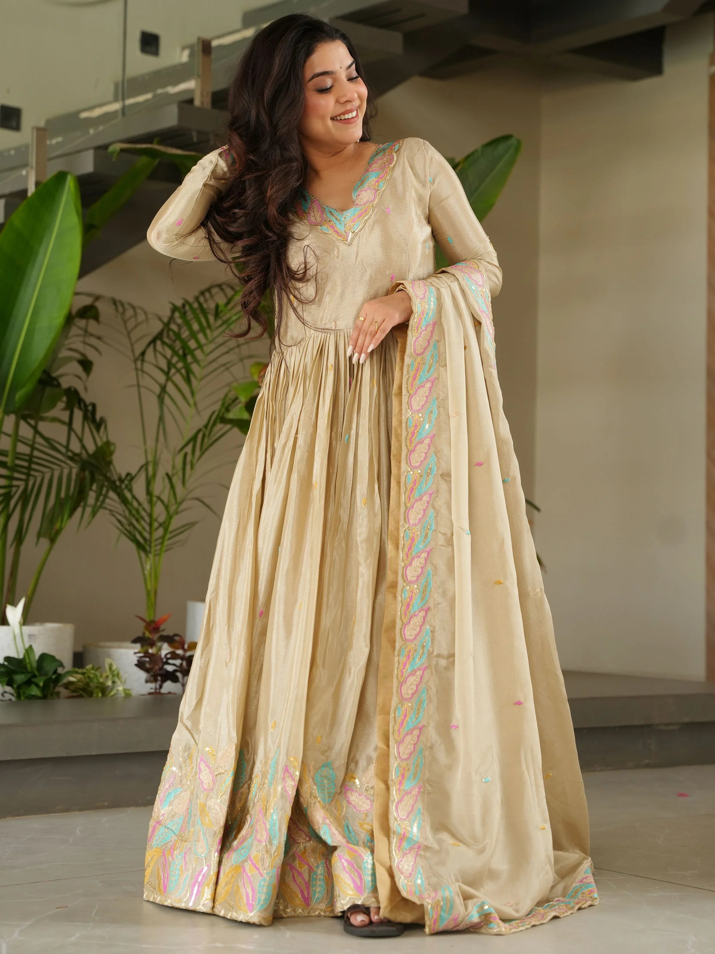 Off white chinnon gown with sequins and multithread embroidery and dupatta