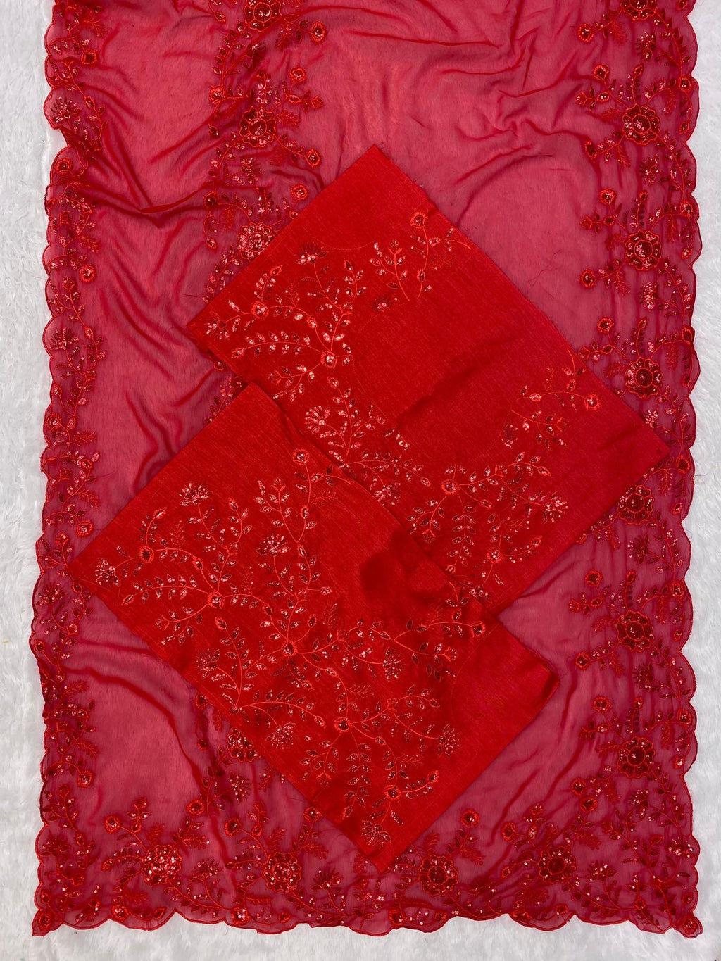 Opulent Red Embroidered Georgette Saree