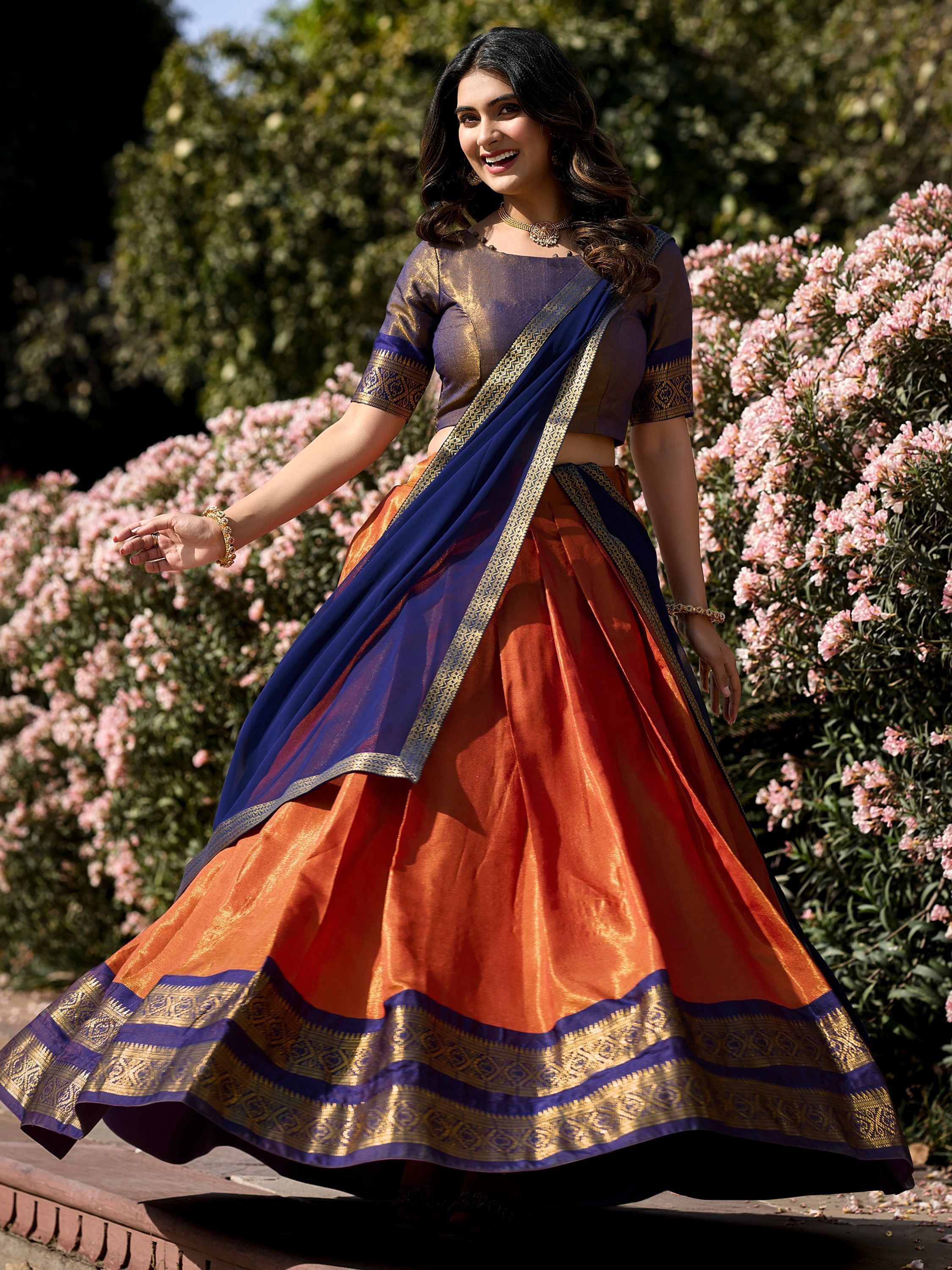Orange kanchipuram silk lehenga choli with zari weaving work