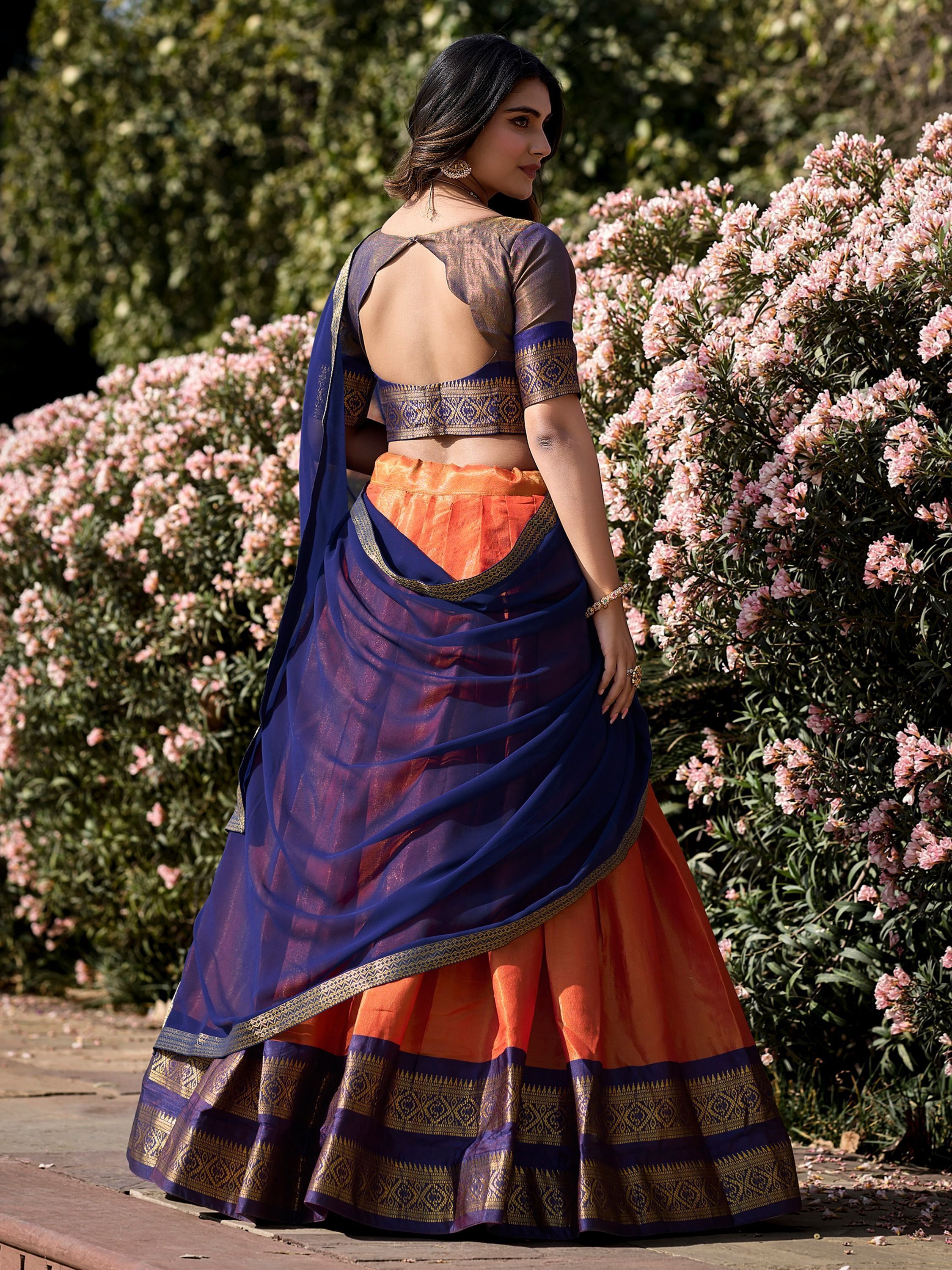 Orange kanchipuram silk lehenga choli with zari weaving work