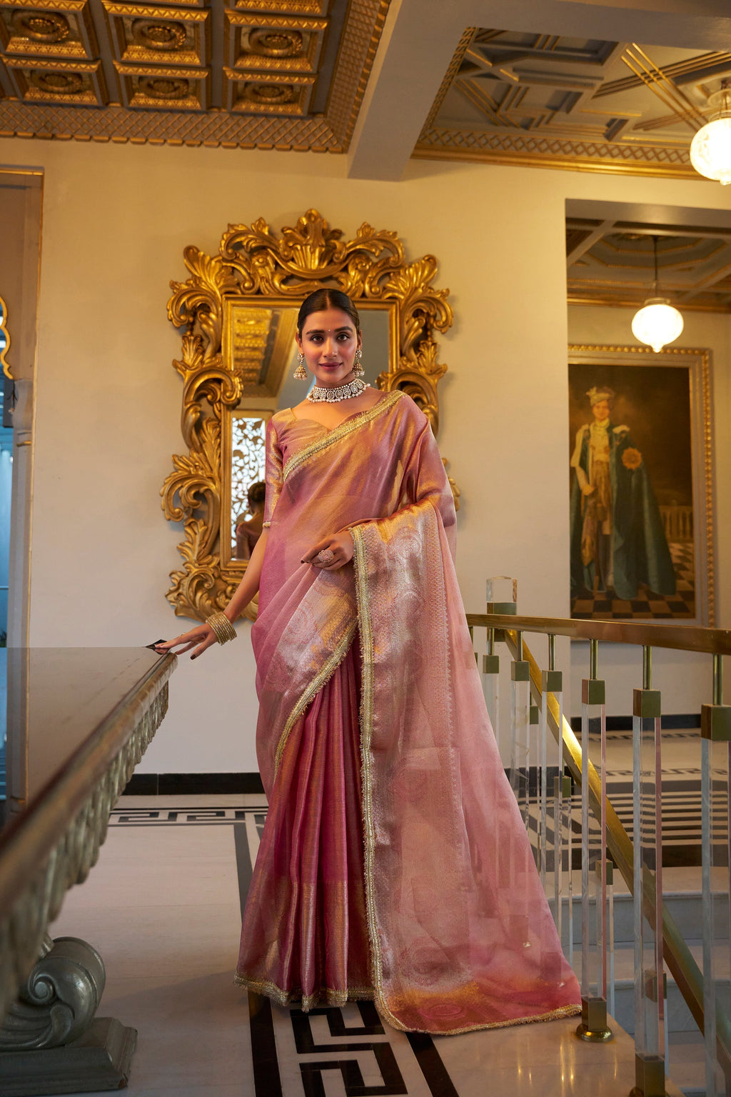 Poorvi light pink tissue shimmer zari weaving saree