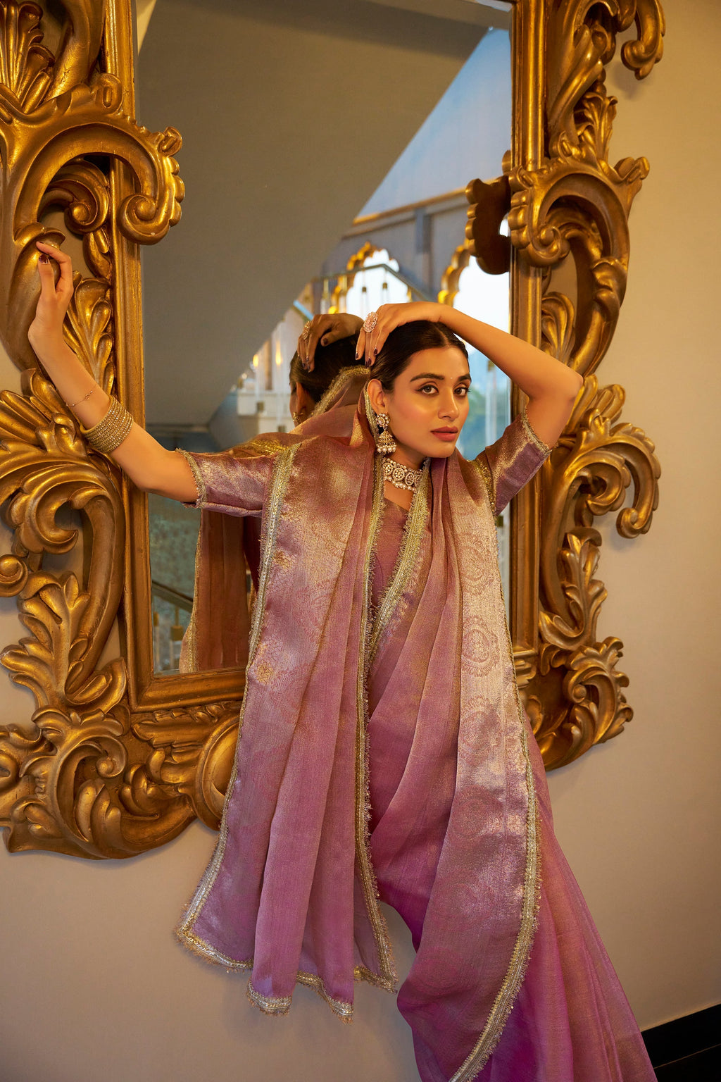 Poorvi light pink tissue shimmer zari weaving saree