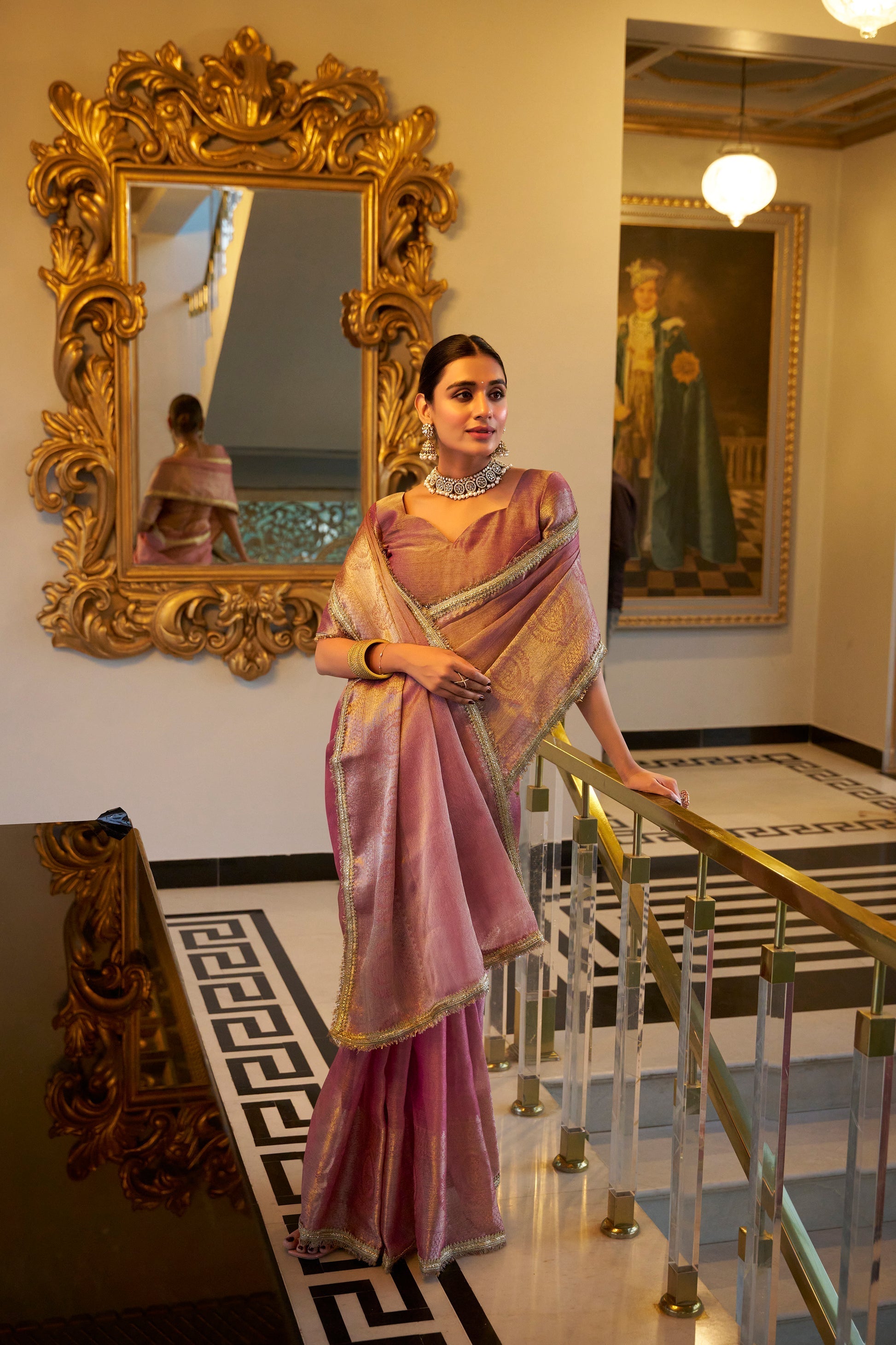 Poorvi light pink tissue shimmer zari weaving saree