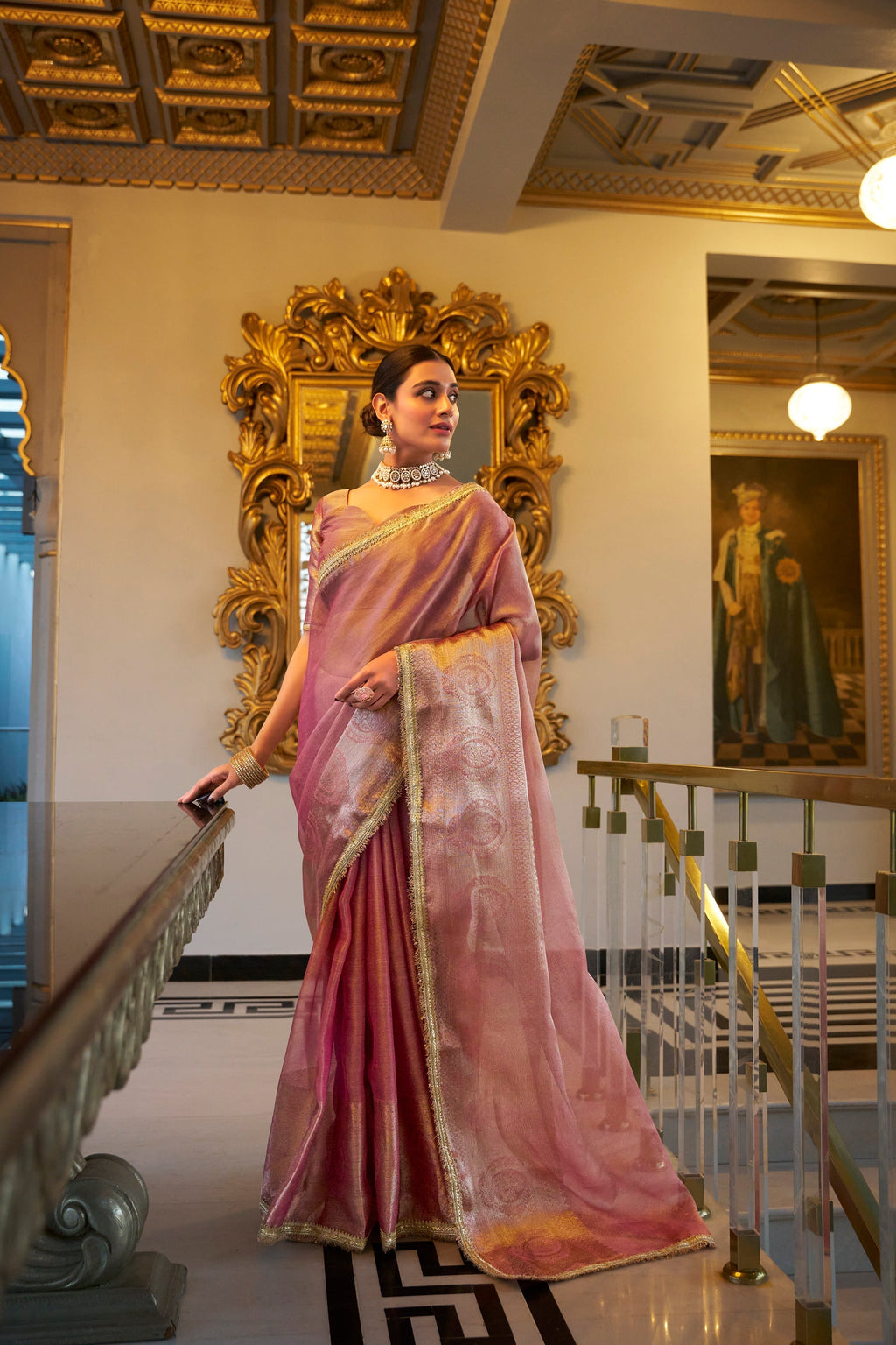 Poorvi light pink tissue shimmer zari weaving saree