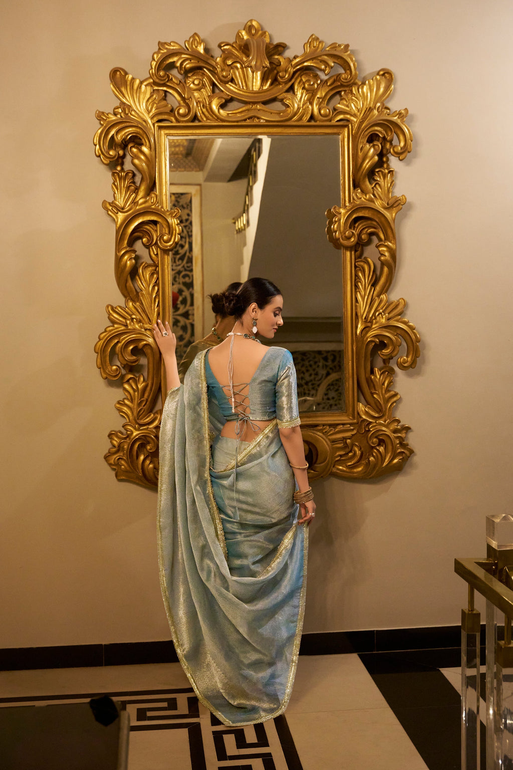 Poorvi sky blue tissue shimmer zari weaving saree