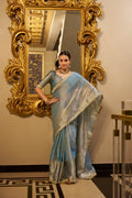 Poorvi sky blue tissue shimmer zari weaving saree