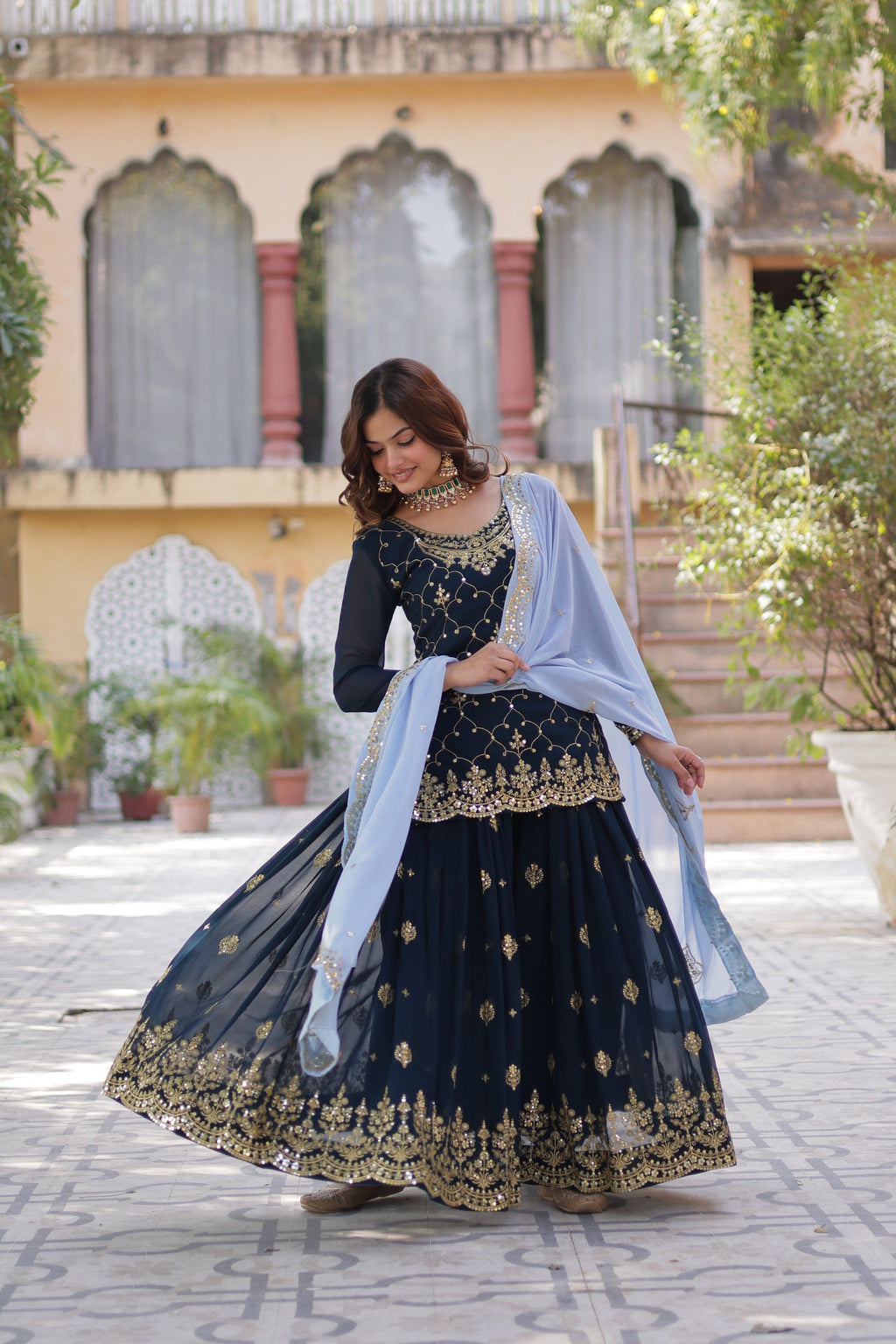 Blue georgette embroidered Pritha designer kurti palazzo suit