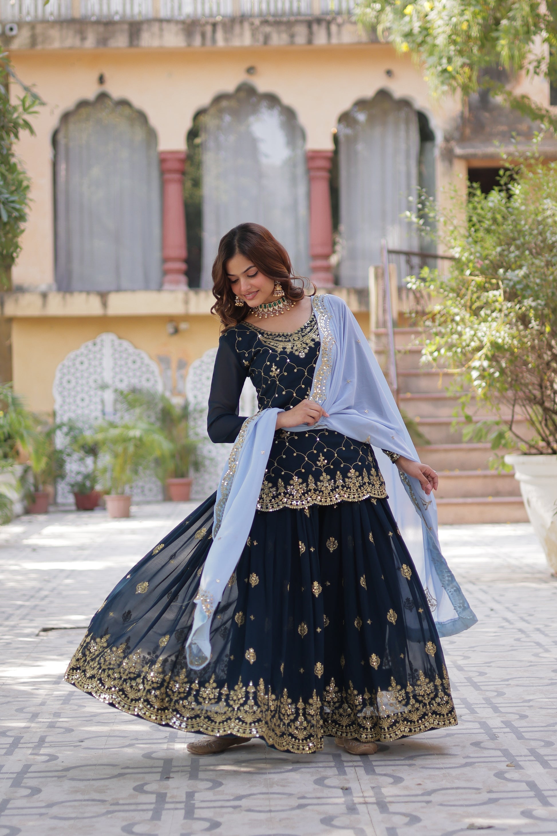 Blue georgette embroidered Pritha designer kurti palazzo suit