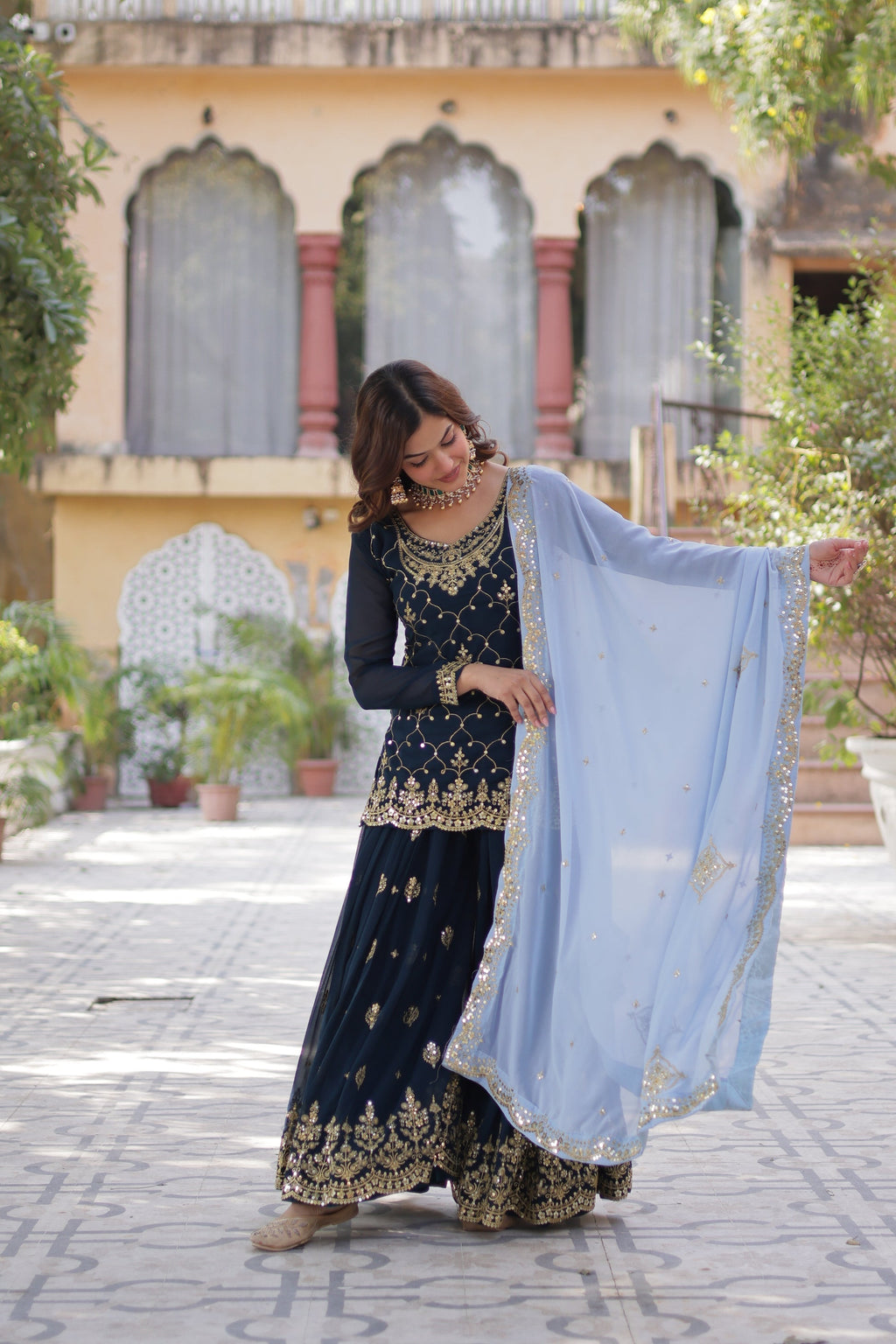 Blue georgette embroidered Pritha designer kurti palazzo suit