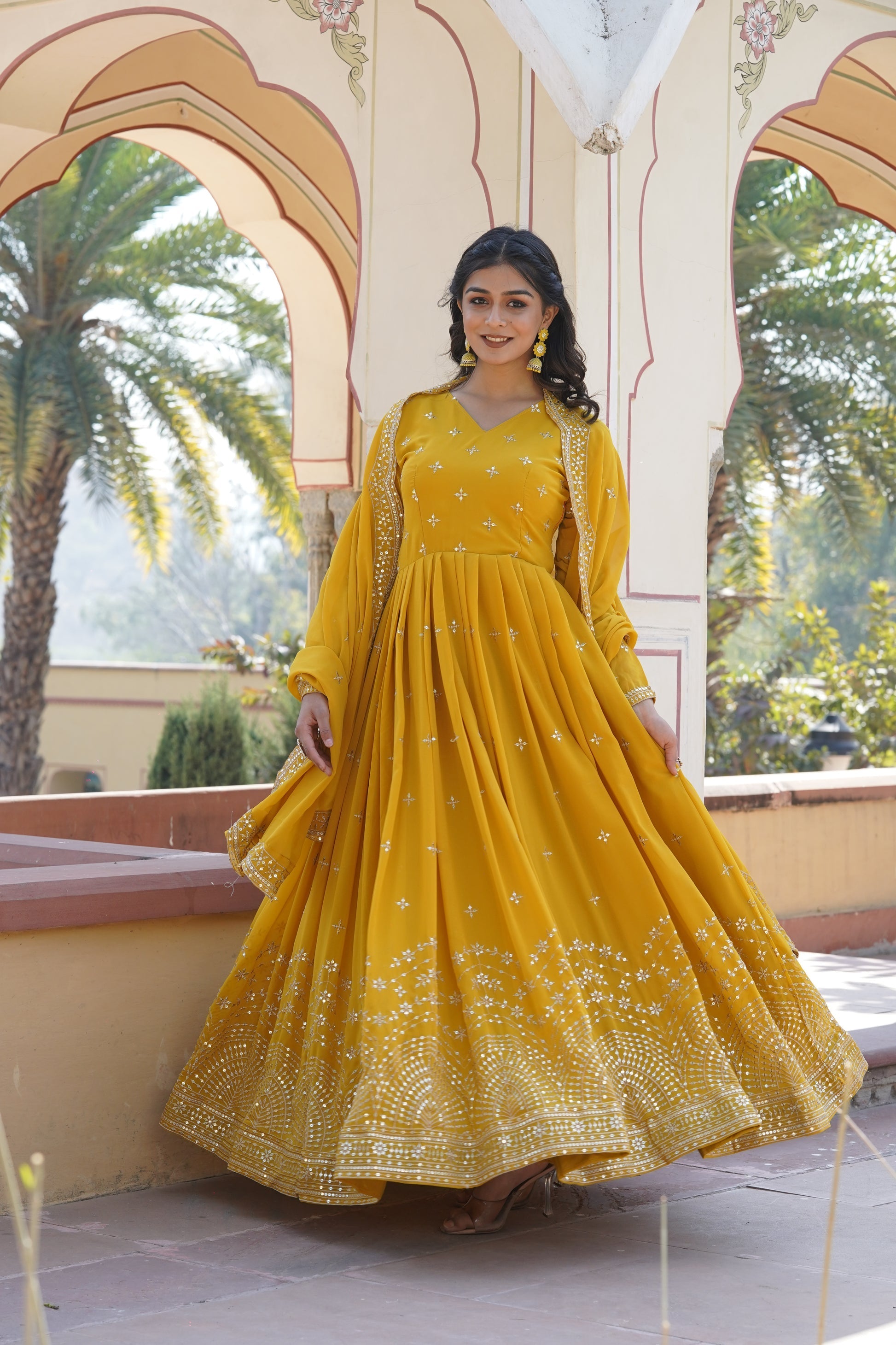 Rithanya yellow georgette embroidered anarkali gown set