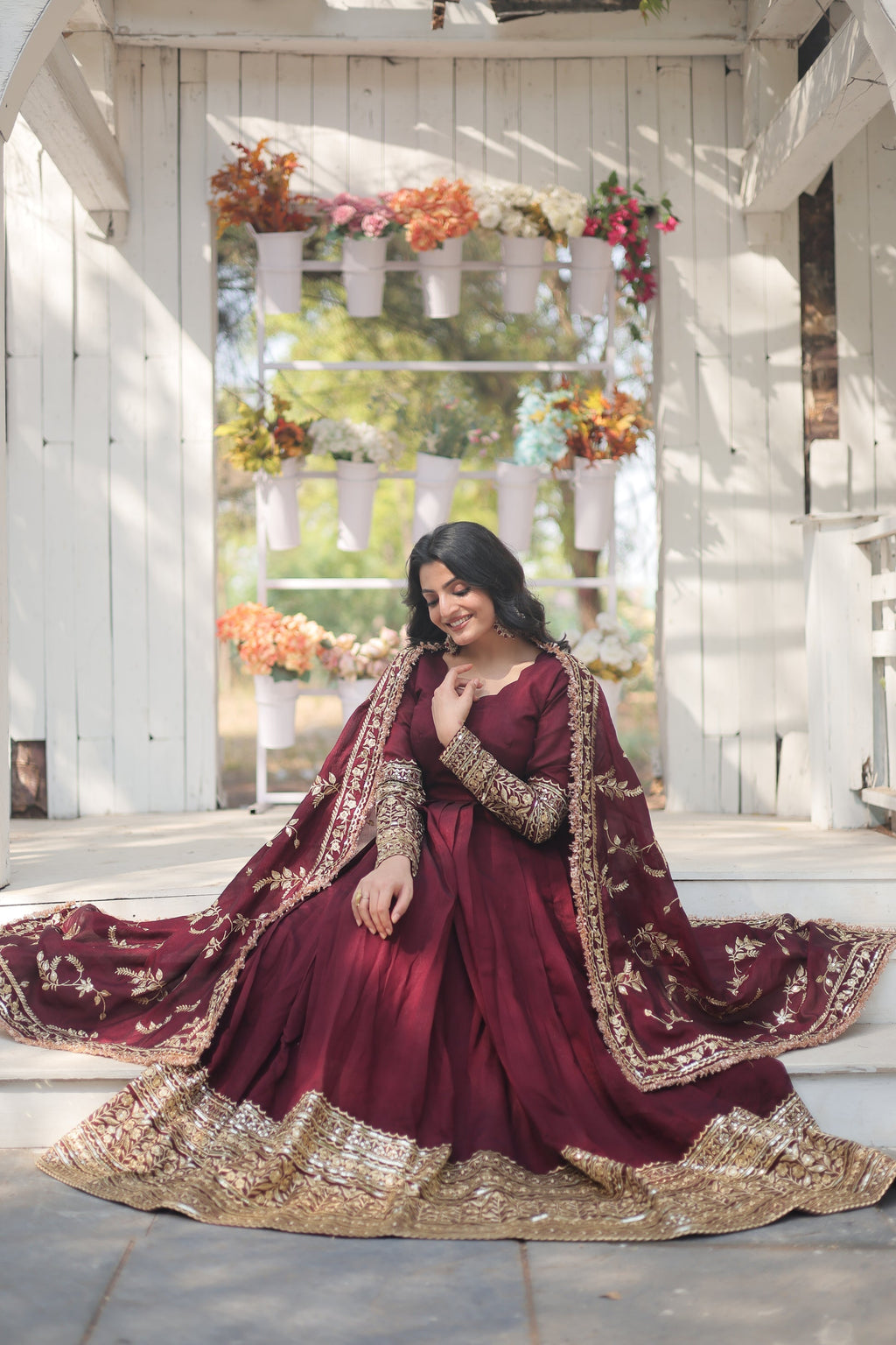 Maroon embroidered Savi designer flared Anarkali gown
