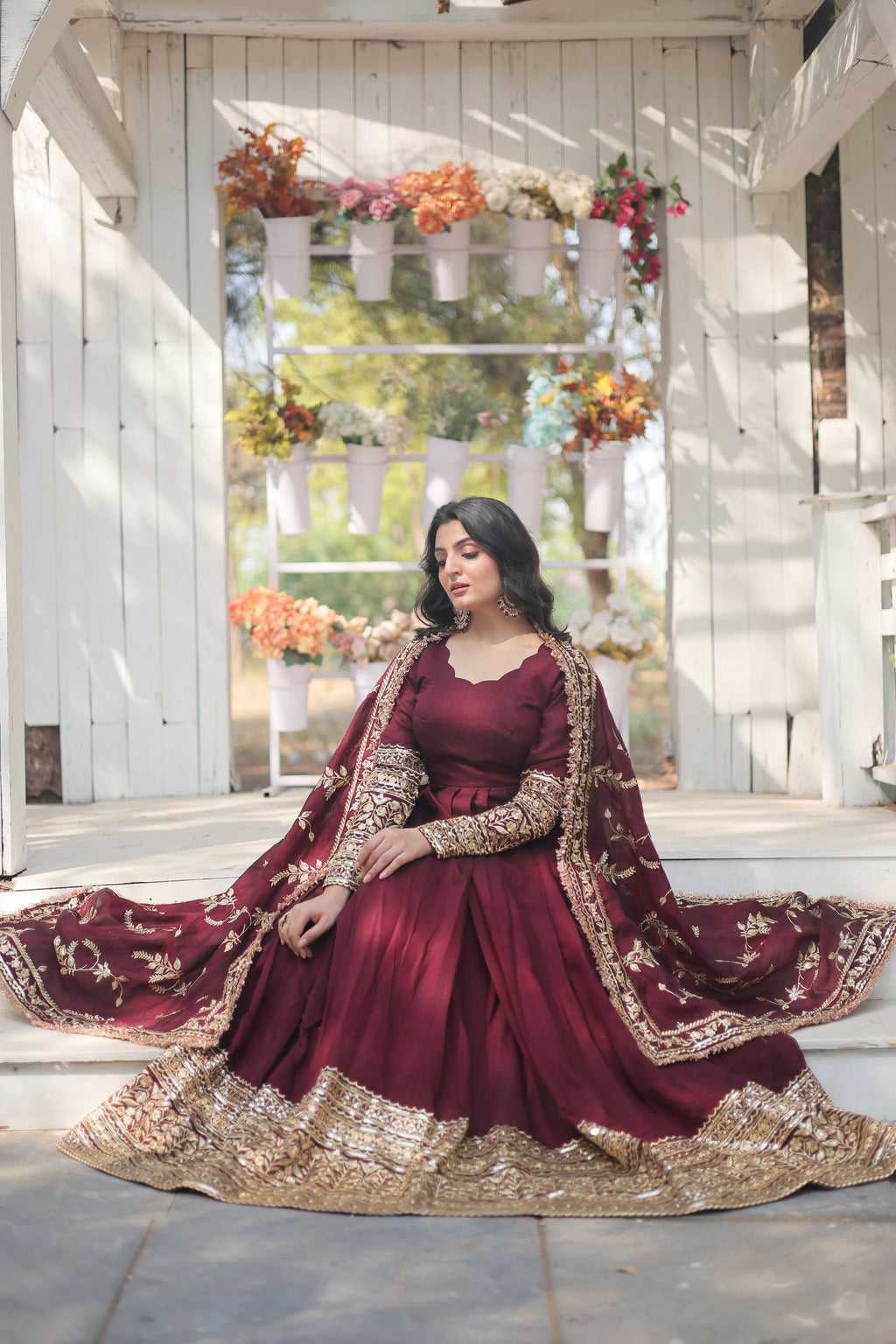 Maroon embroidered Savi designer flared Anarkali gown