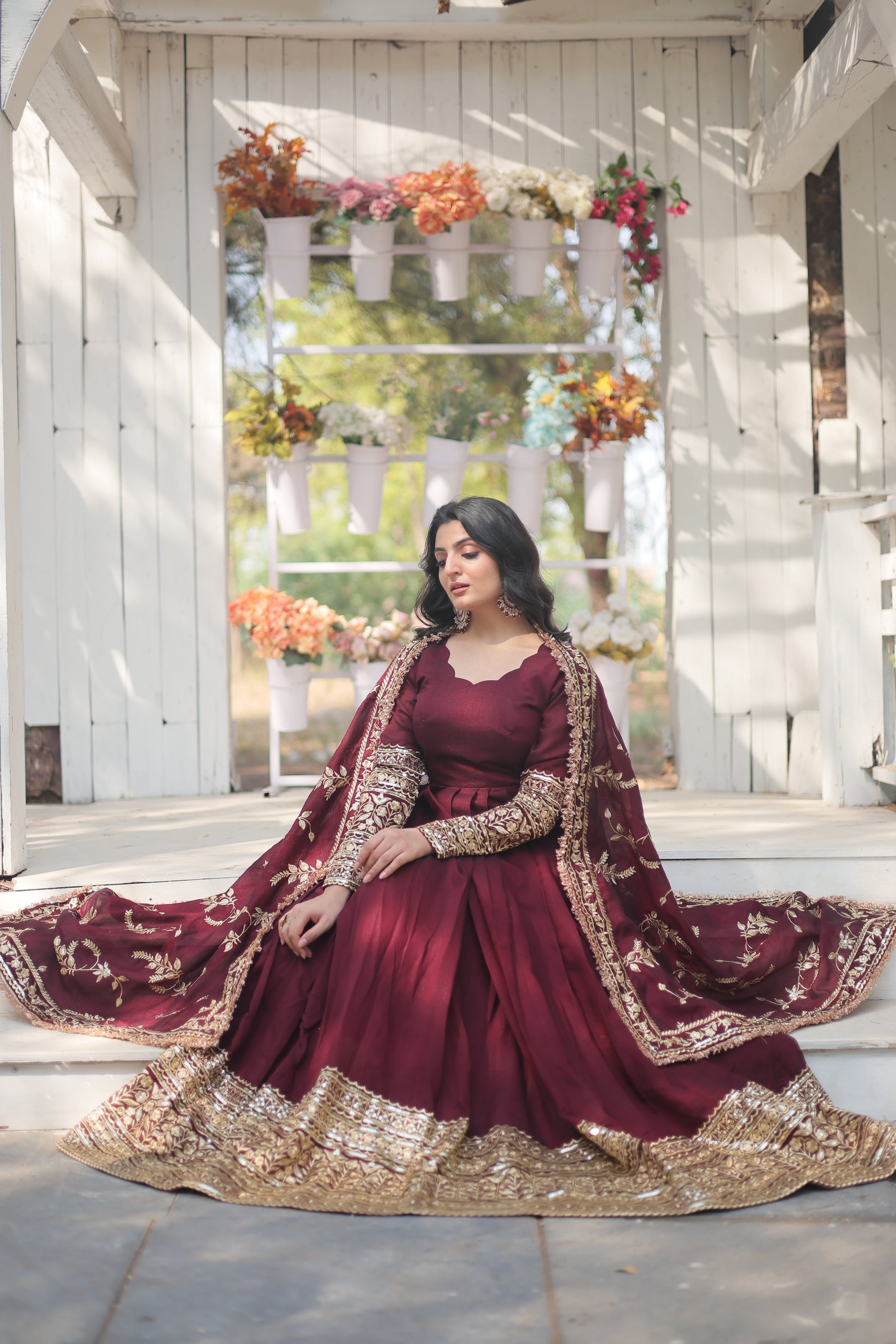 Maroon embroidered Savi designer flared Anarkali gown