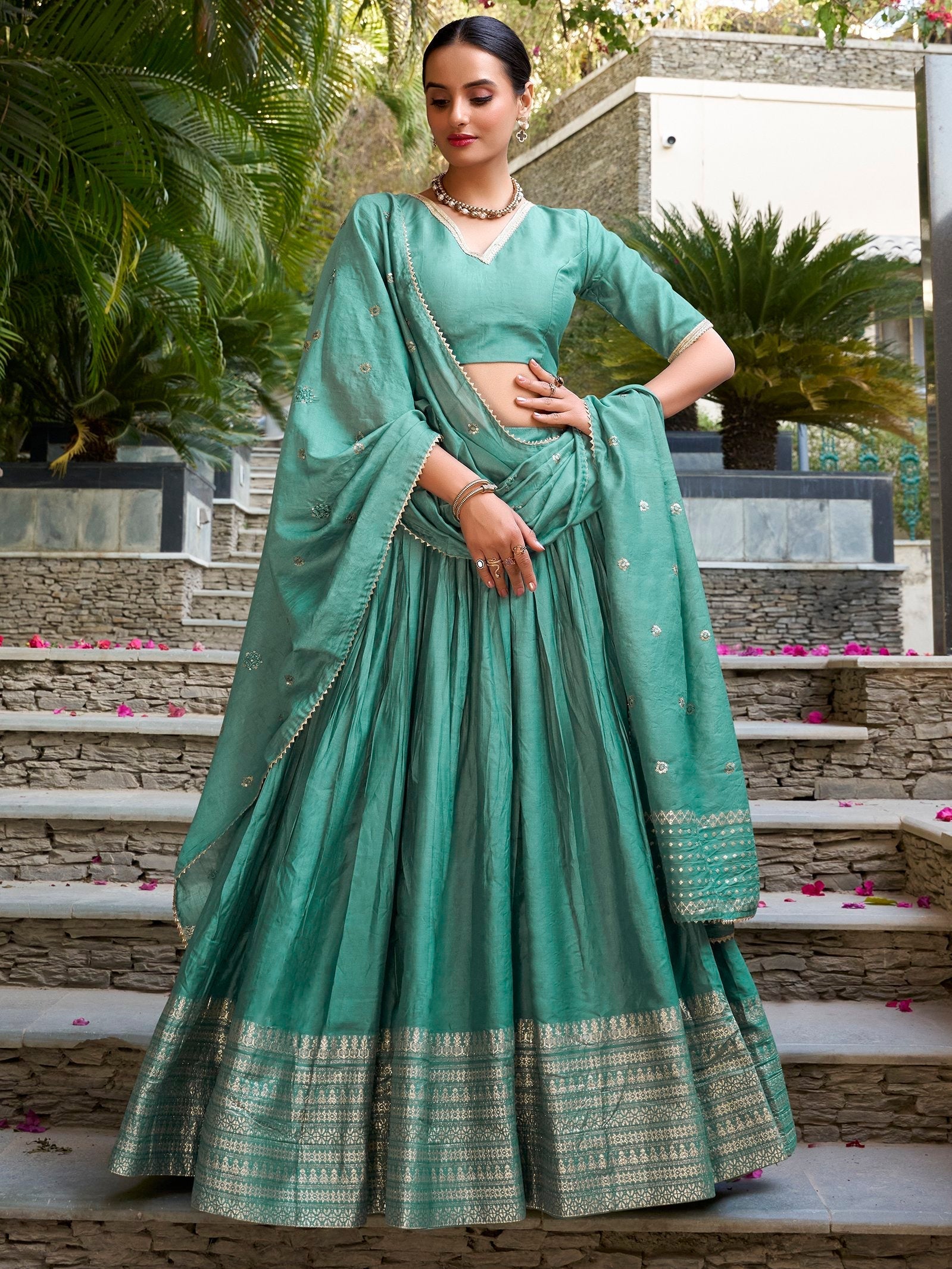 Sea green pure chanderi lehenga choli with plain zari weaving