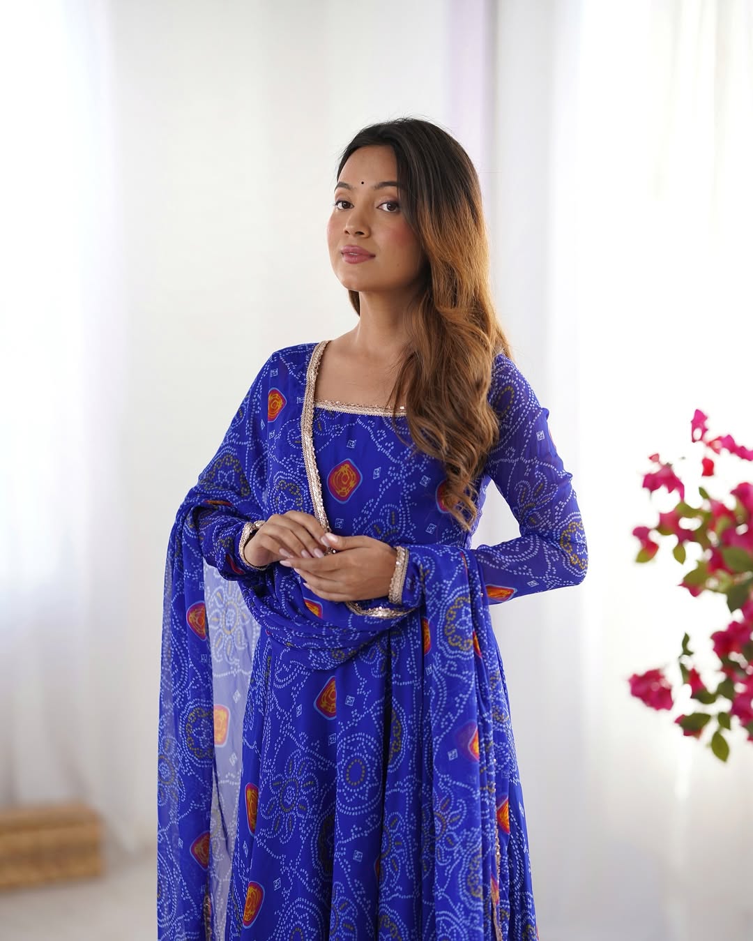 Shanvi Bandhej Chiffon Anarkali Suit Set – blue Bandhej Anarkali gown, traditional chiffon ethnic wear, women’s blue ethnic dress, Bandhej printed Anarkali for weddings, designer ethnic gown, Anarkali suit with lace dupatta, flair Anarkali with full sleeves, Bandhej print ethnic dress, blue festival wear gown, Indian wedding guest Anarkali.