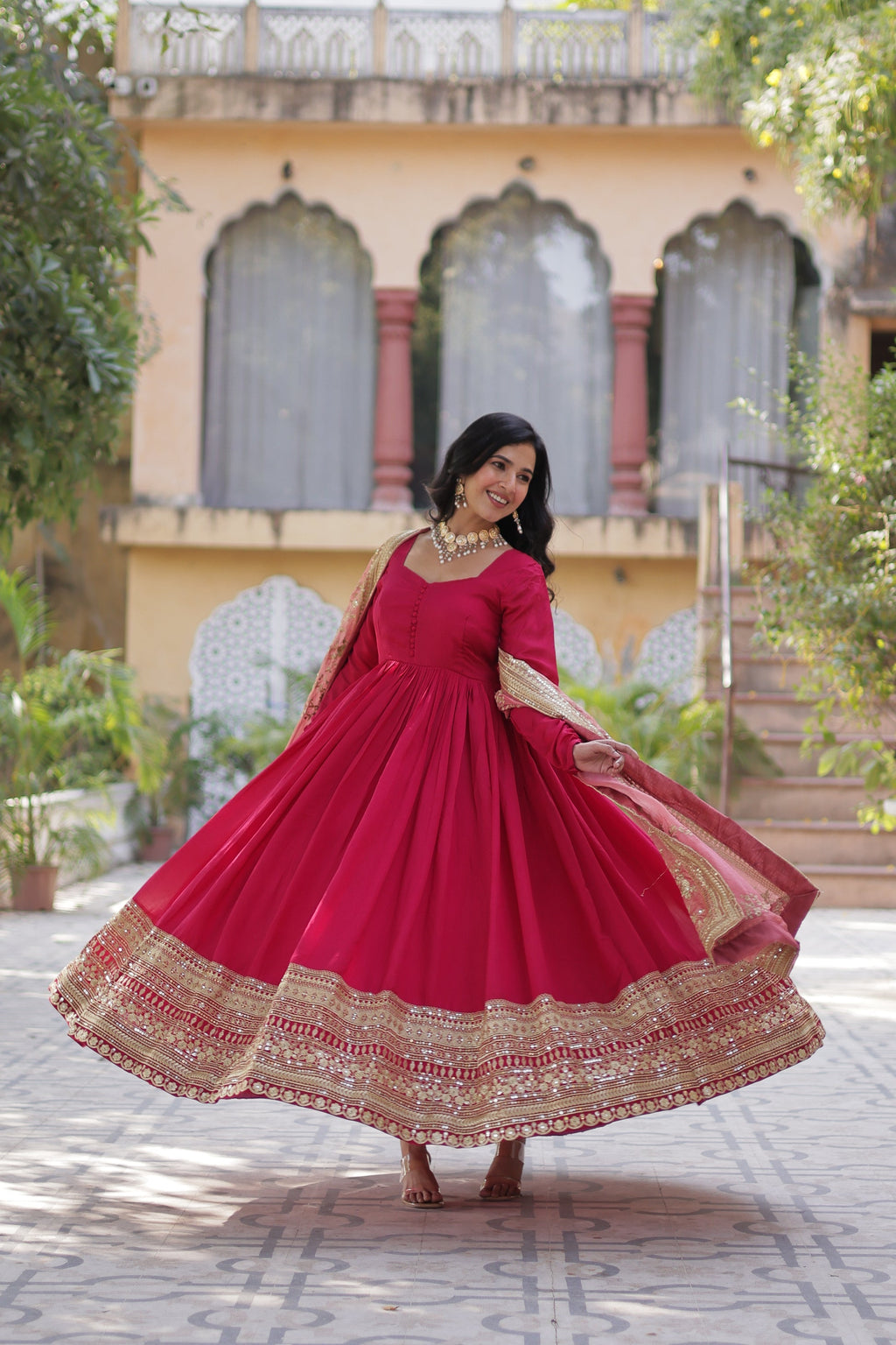 Pink embroidered flared Shruti designer Anarkali gown