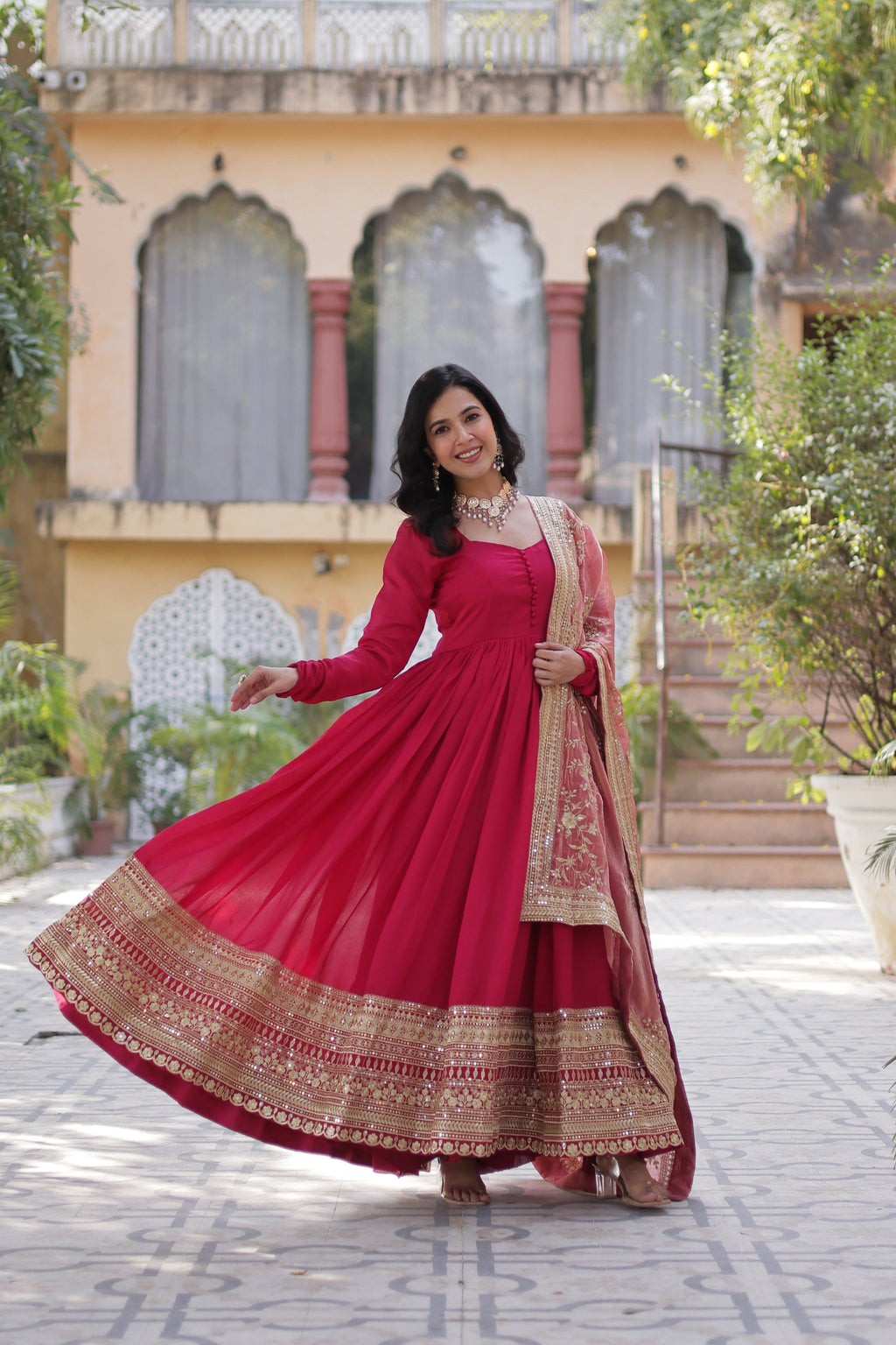 Pink embroidered flared Shruti designer Anarkali gown
