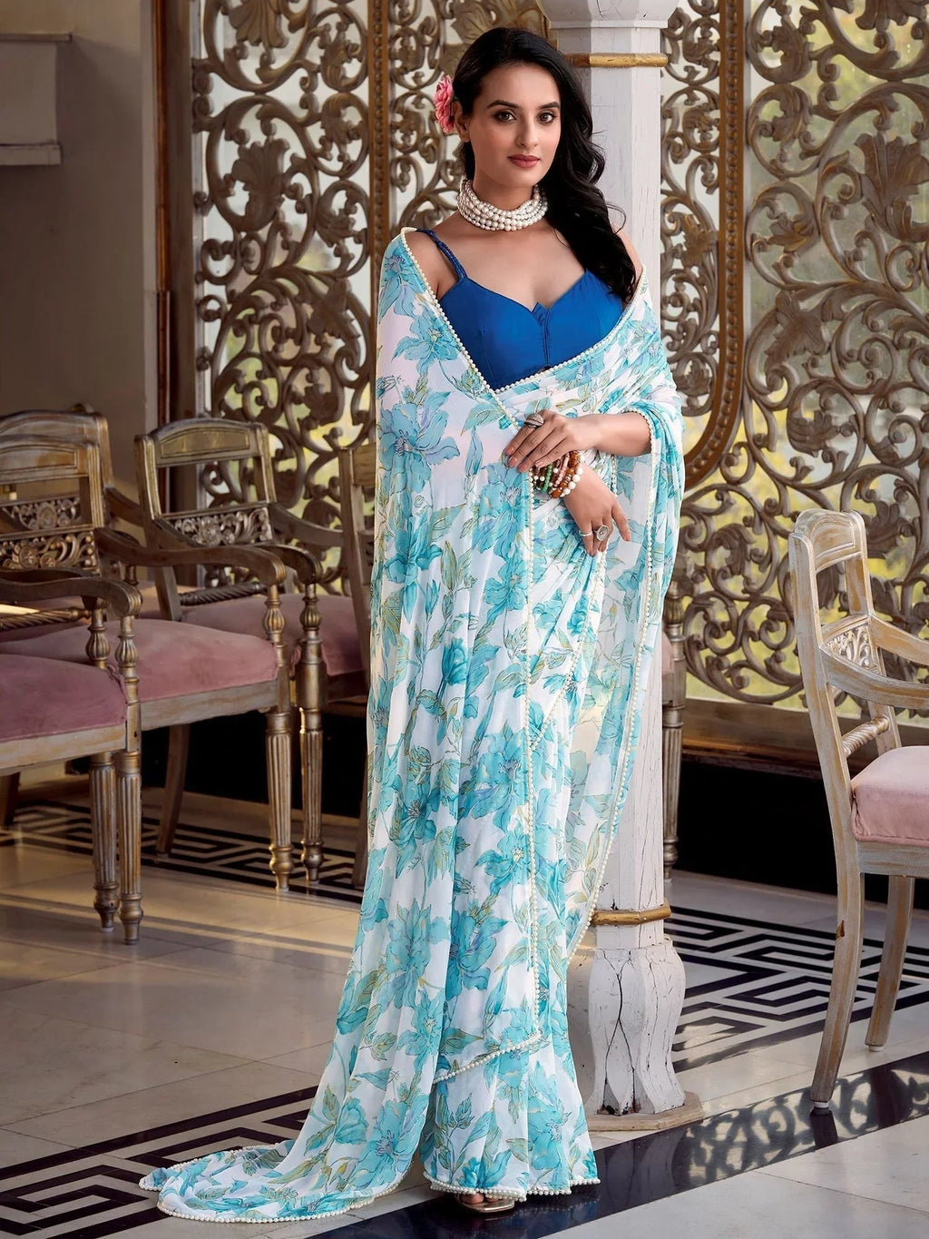 Sky blue chiffon floral print pearl lace border saree with blouse