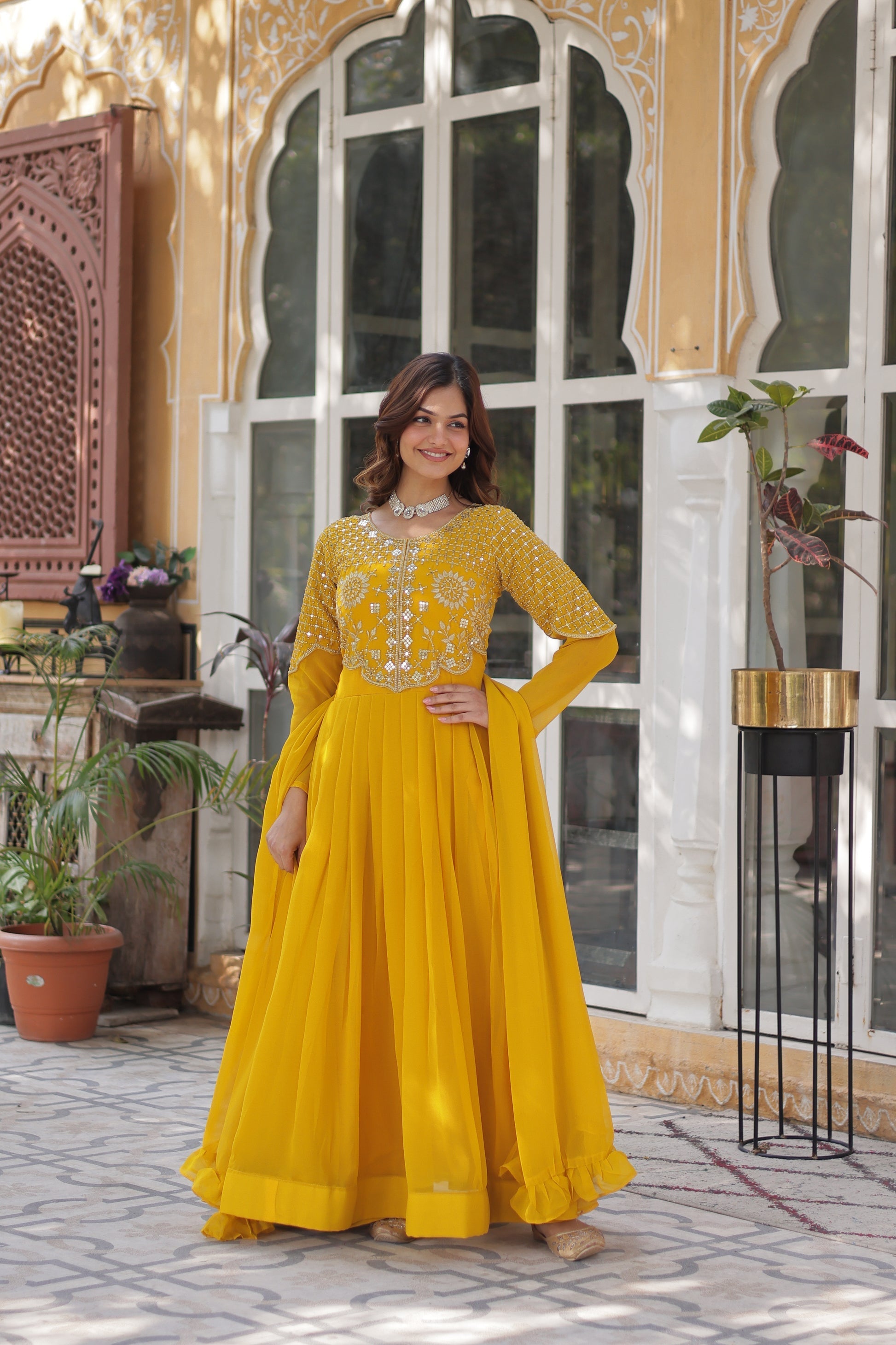 Tarakini yellow embroidered anarkali gown set