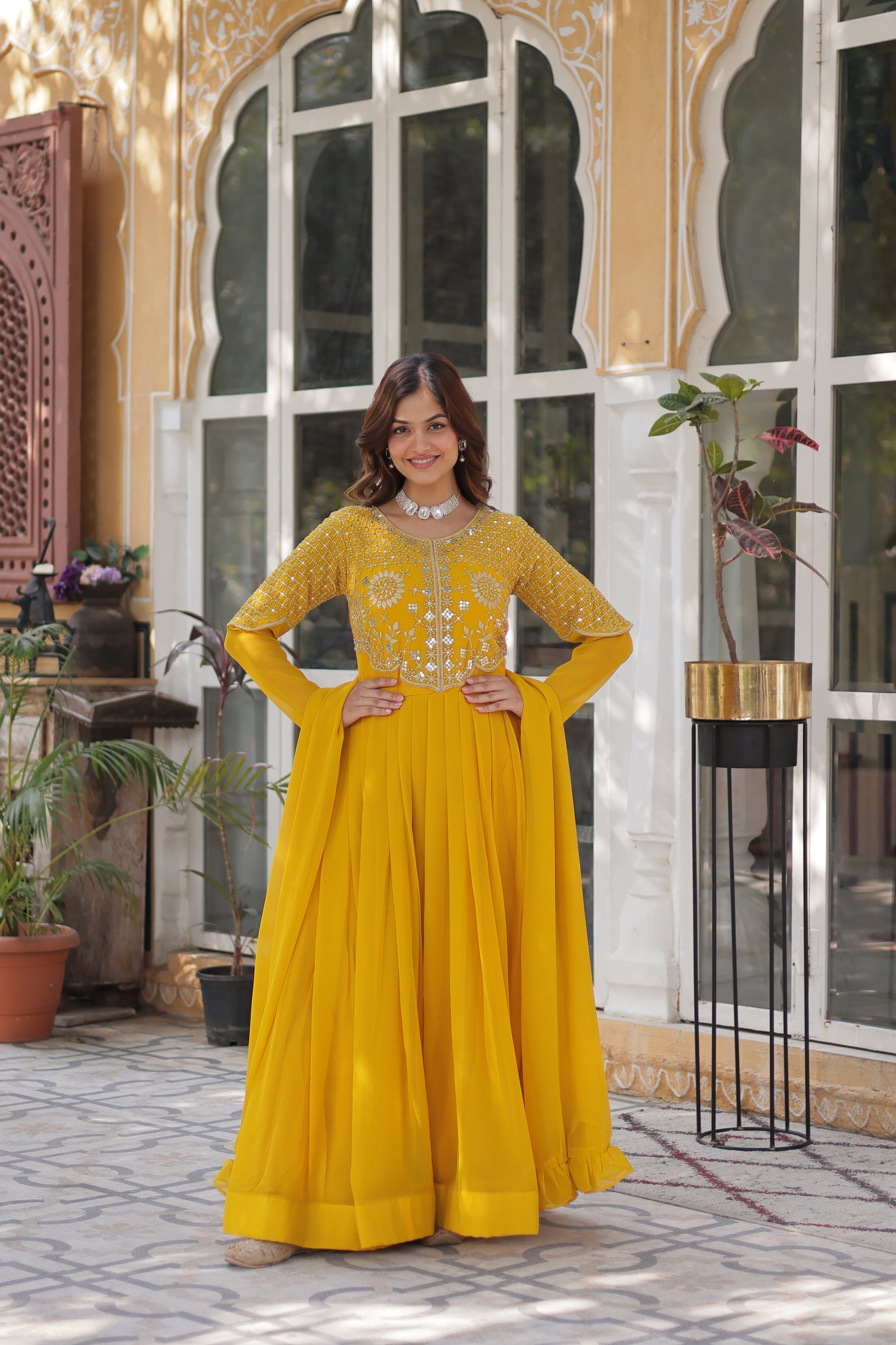 Tarakini yellow embroidered anarkali gown set
