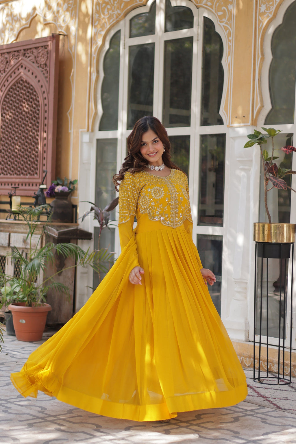 Tarakini yellow embroidered anarkali gown set