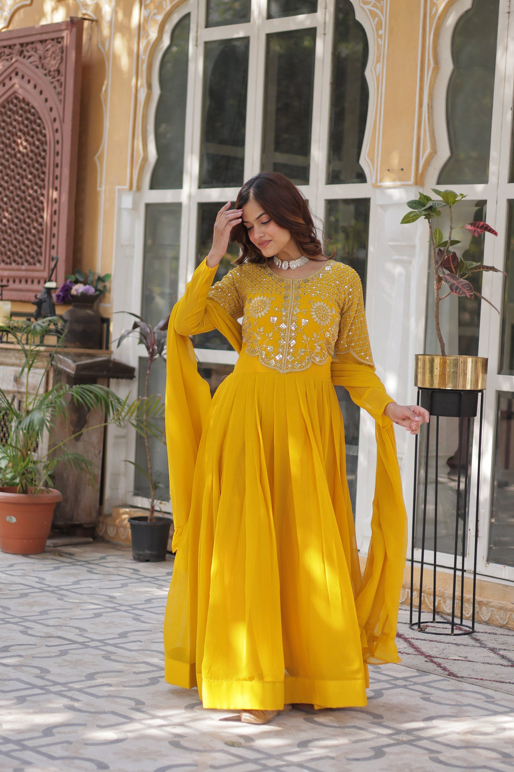 Tarakini yellow embroidered anarkali gown set