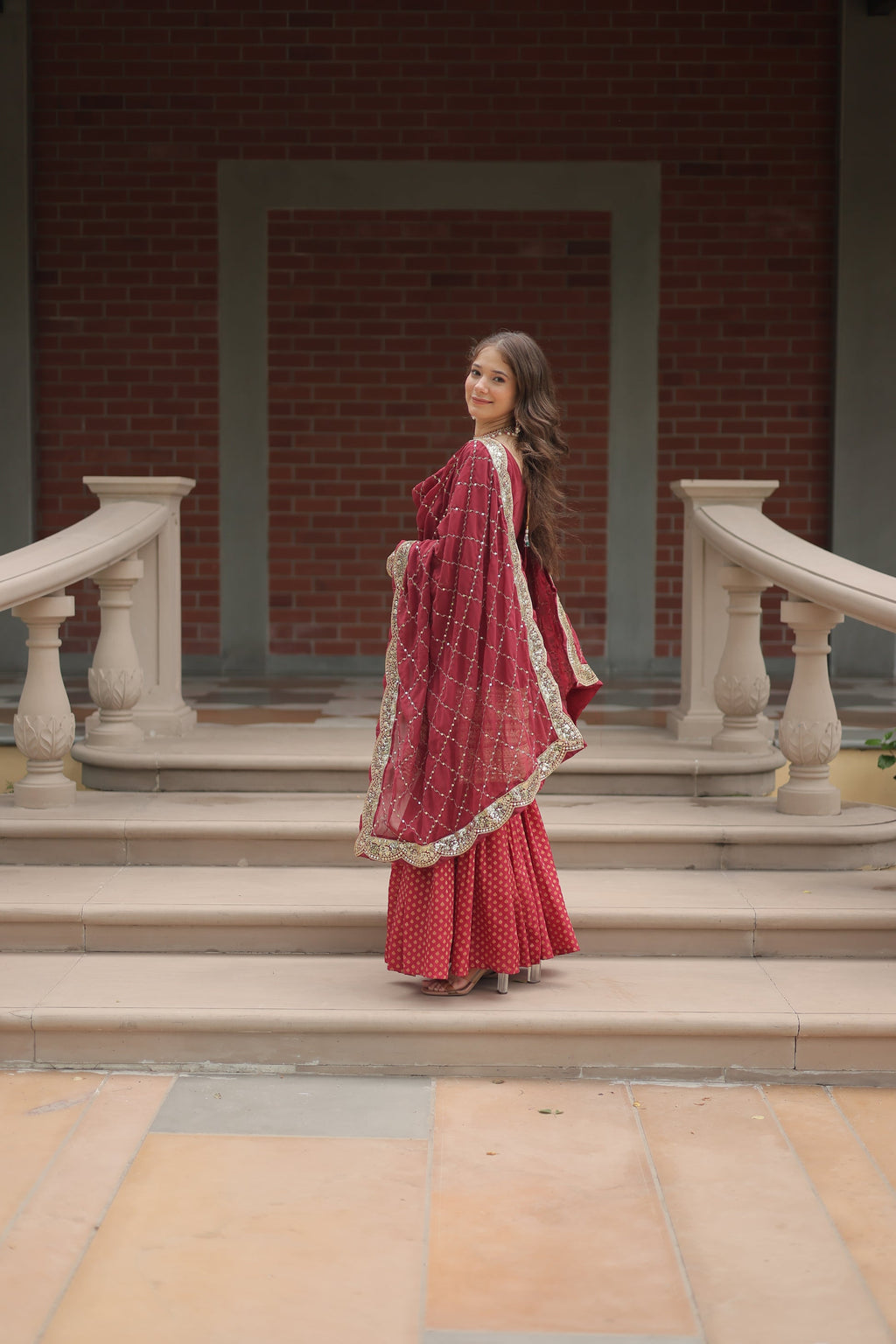 Maroon georgette embroidered Tishya designer sharara suit
