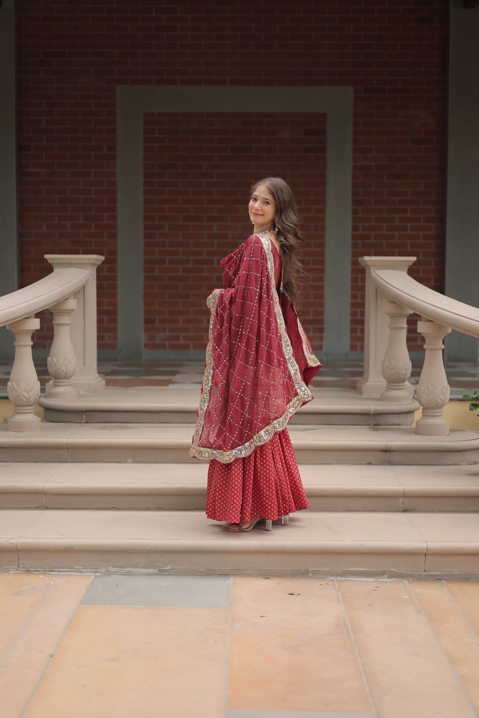 Maroon georgette embroidered Tishya designer sharara suit