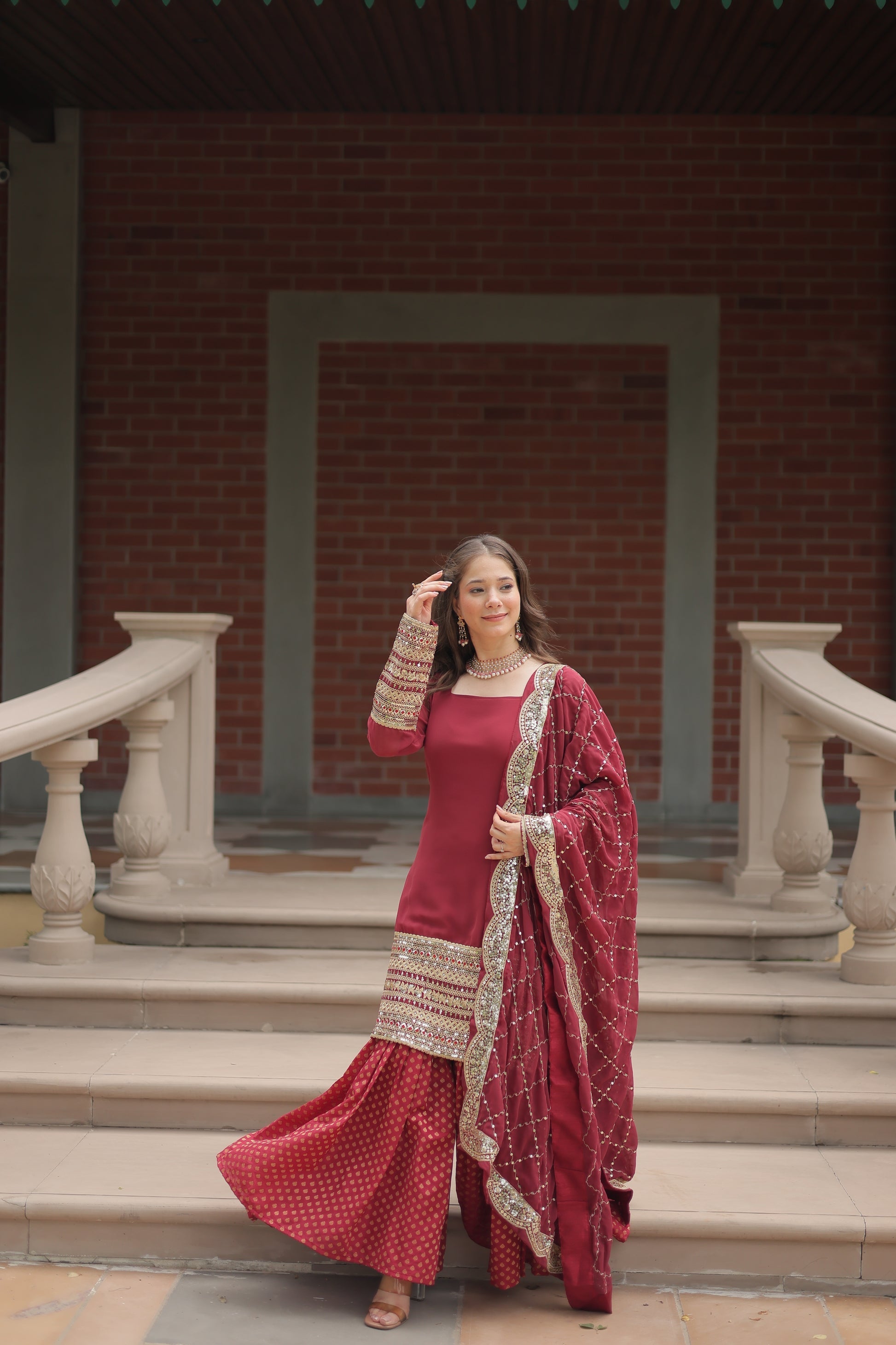 Maroon georgette embroidered Tishya designer sharara suit