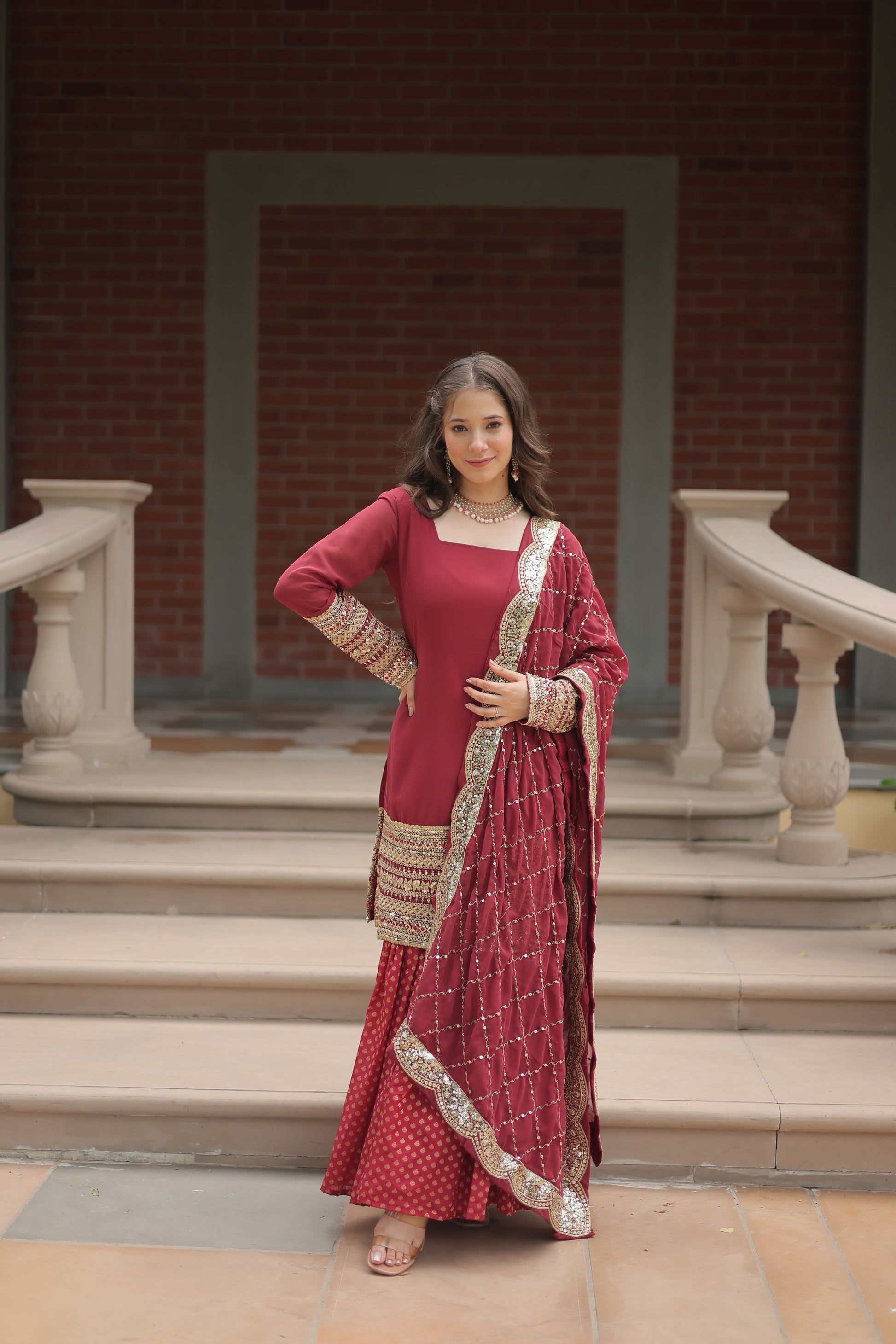 Maroon georgette embroidered Tishya designer sharara suit