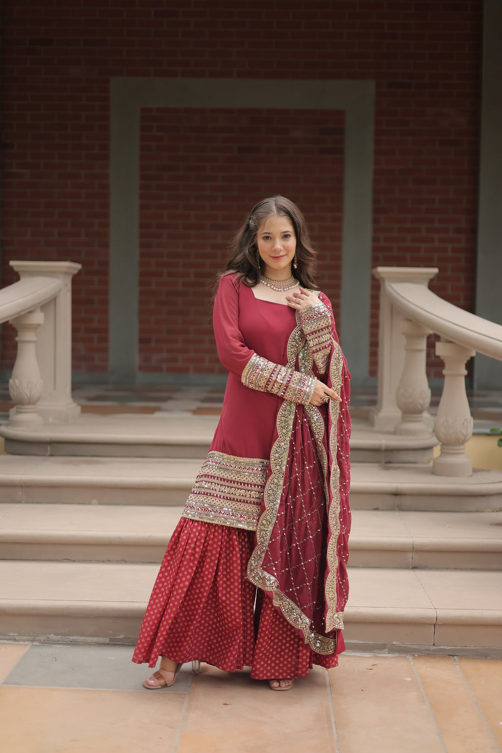 Maroon georgette embroidered Tishya designer sharara suit