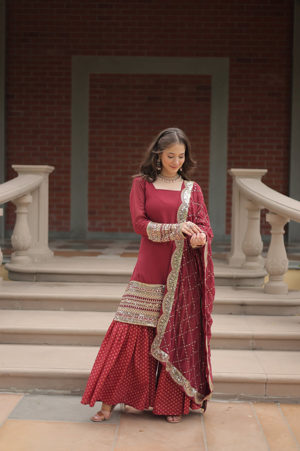 Maroon georgette embroidered Tishya designer sharara suit