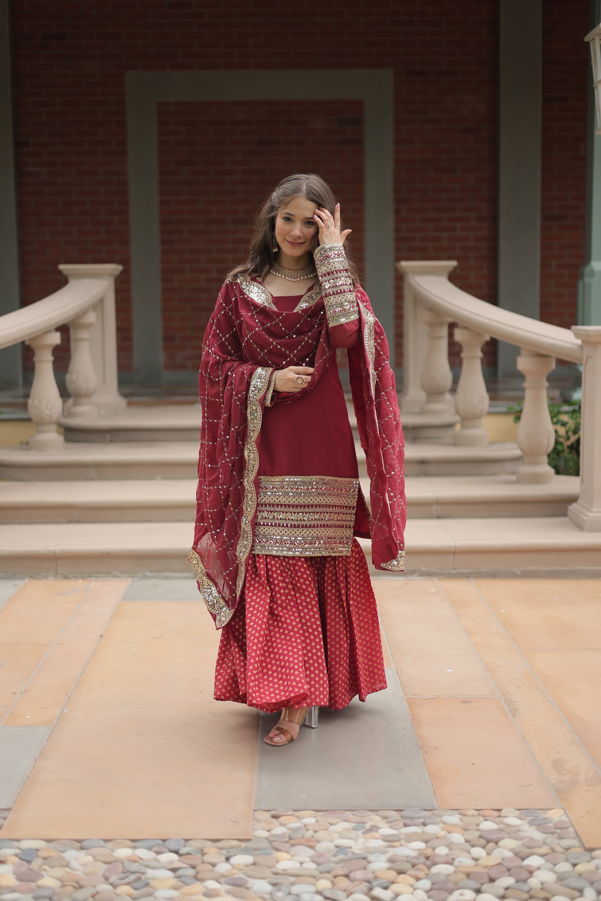 Maroon georgette embroidered Tishya designer sharara suit