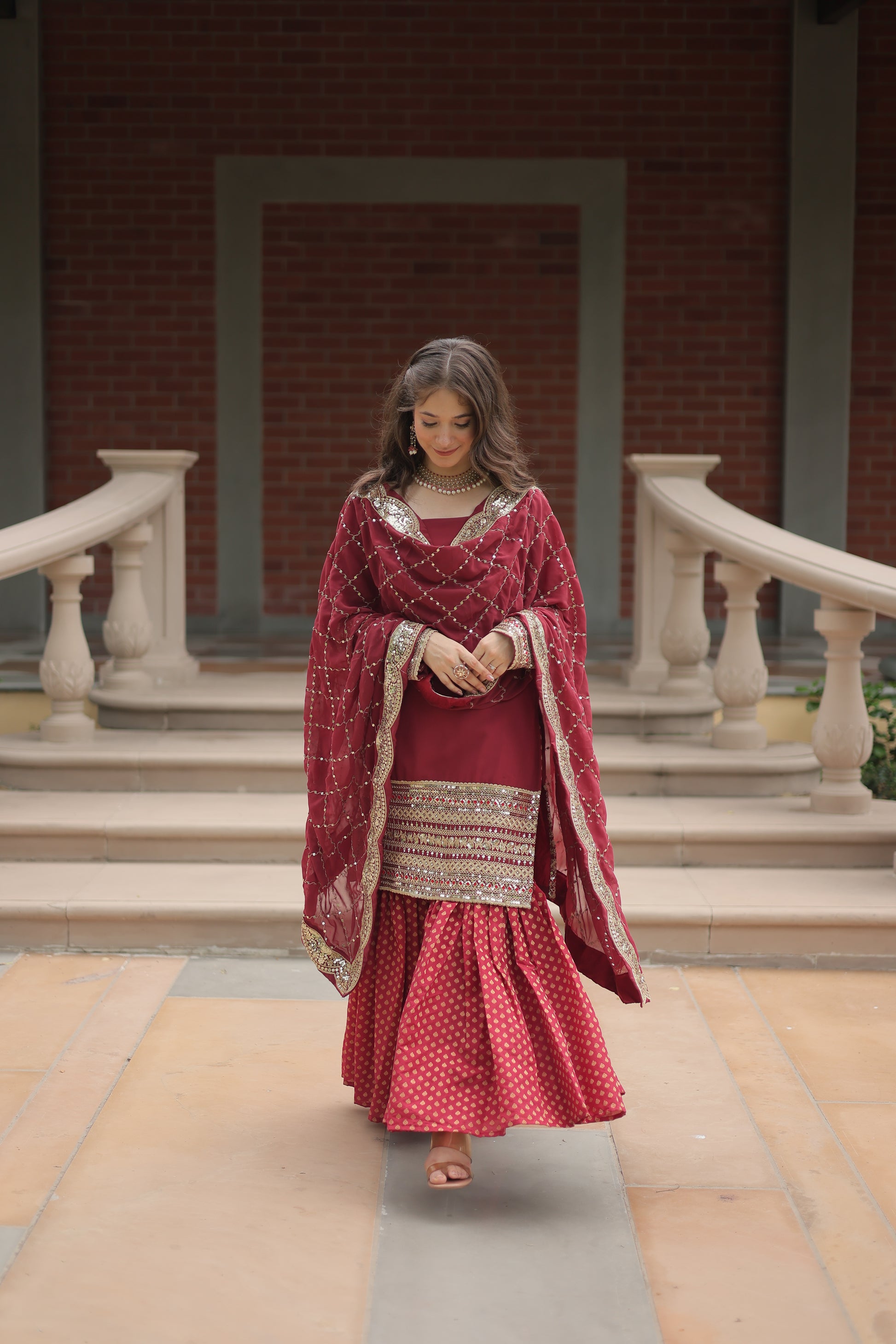 Maroon georgette embroidered Tishya designer sharara suit