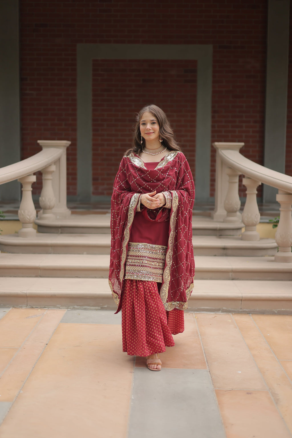 Maroon georgette embroidered Tishya designer sharara suit