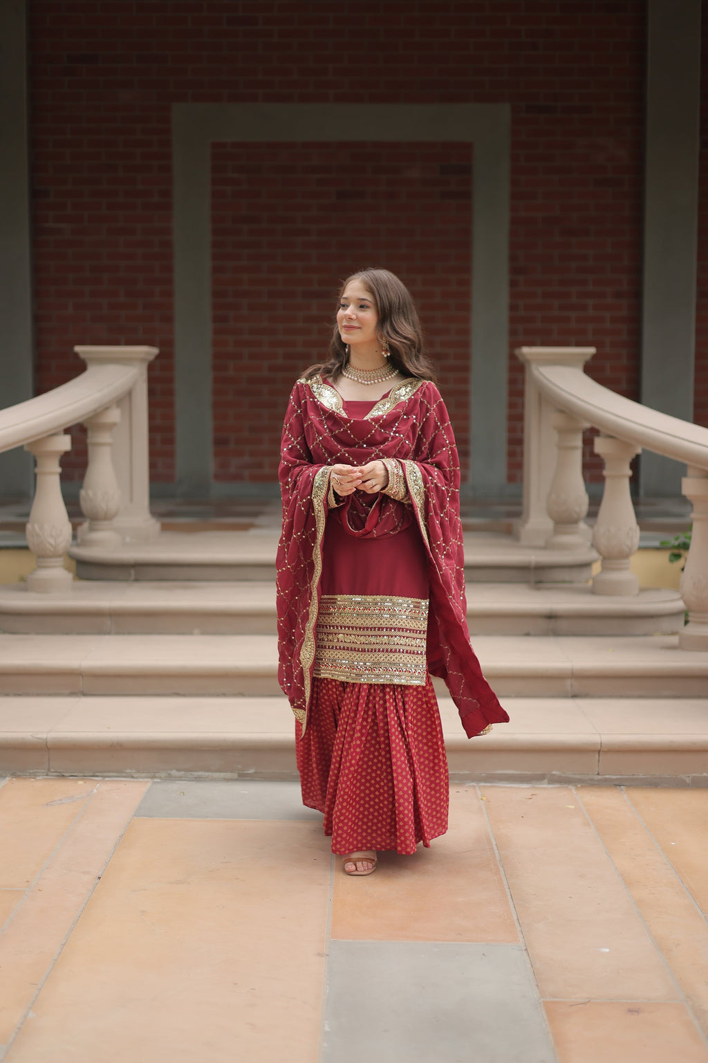 Maroon georgette embroidered Tishya designer sharara suit