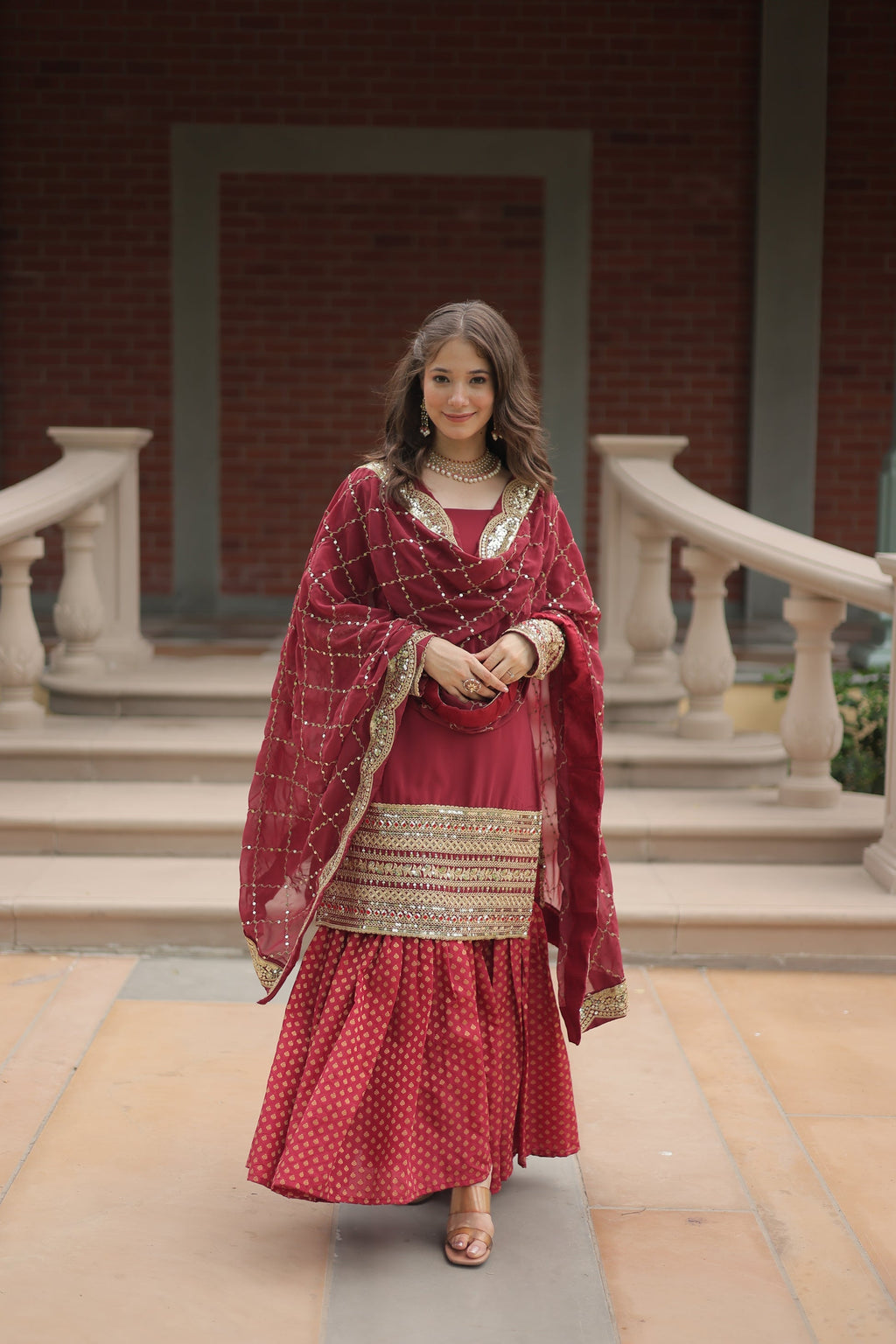 Maroon georgette embroidered Tishya designer sharara suit