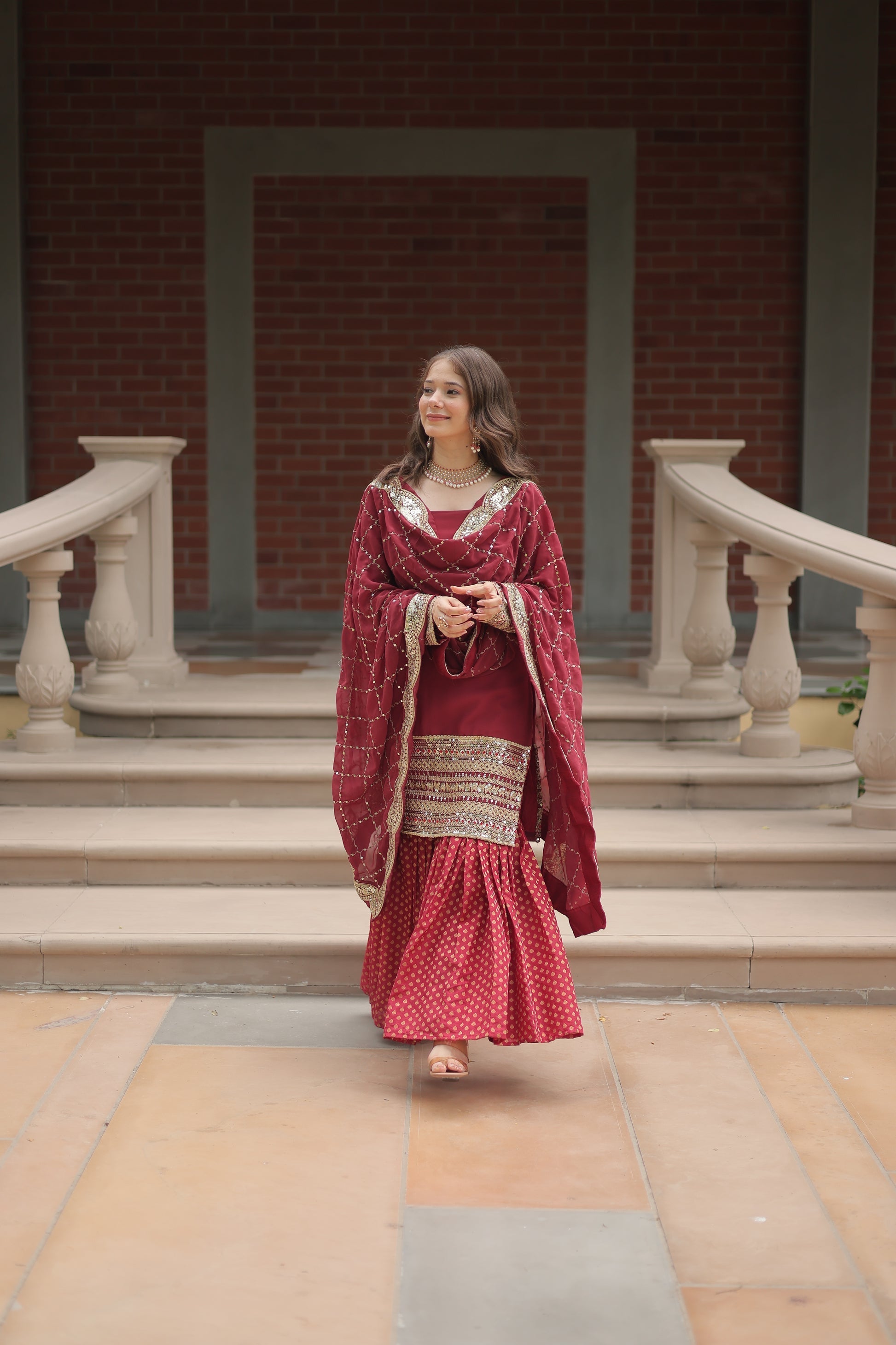 Maroon georgette embroidered Tishya designer sharara suit