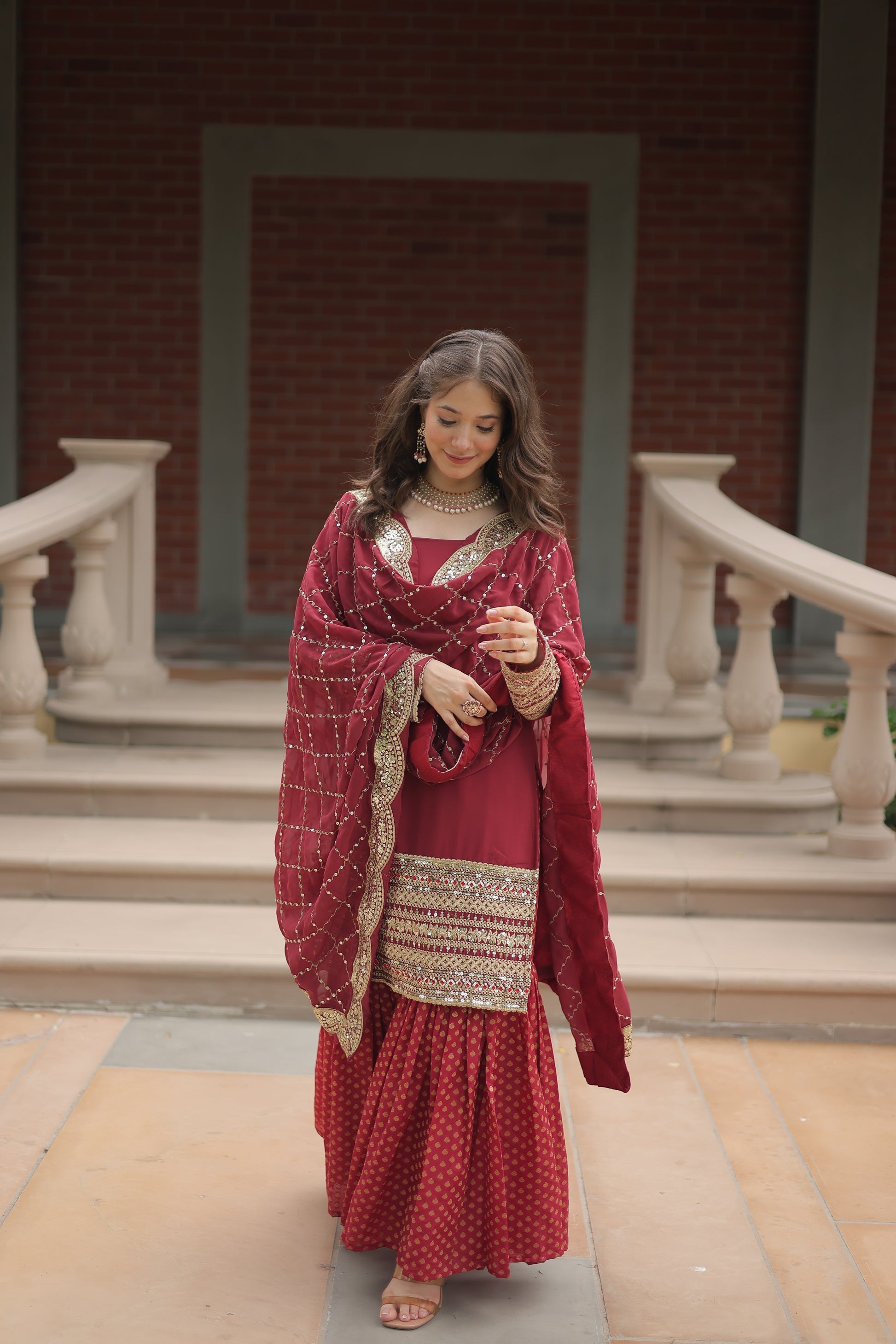 Maroon georgette embroidered Tishya designer sharara suit