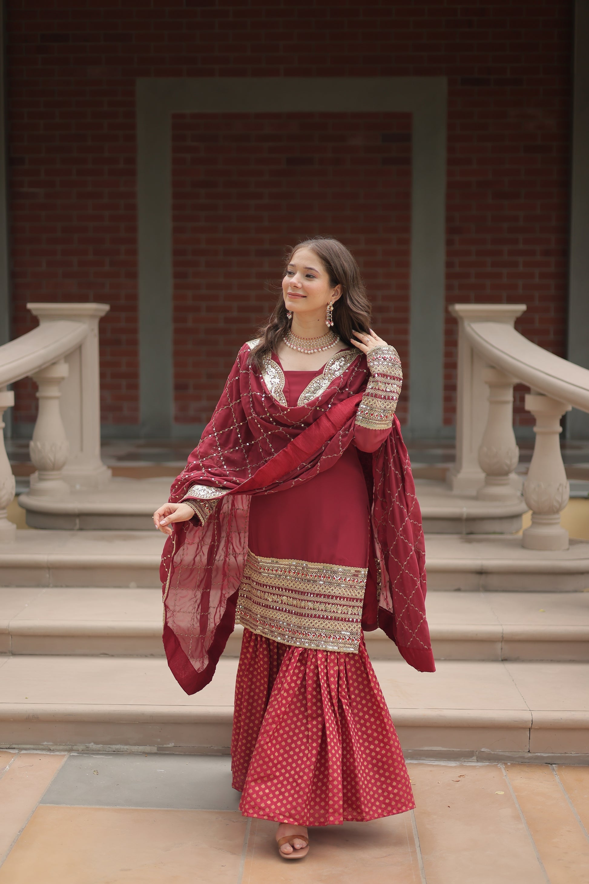 Maroon georgette embroidered Tishya designer sharara suit